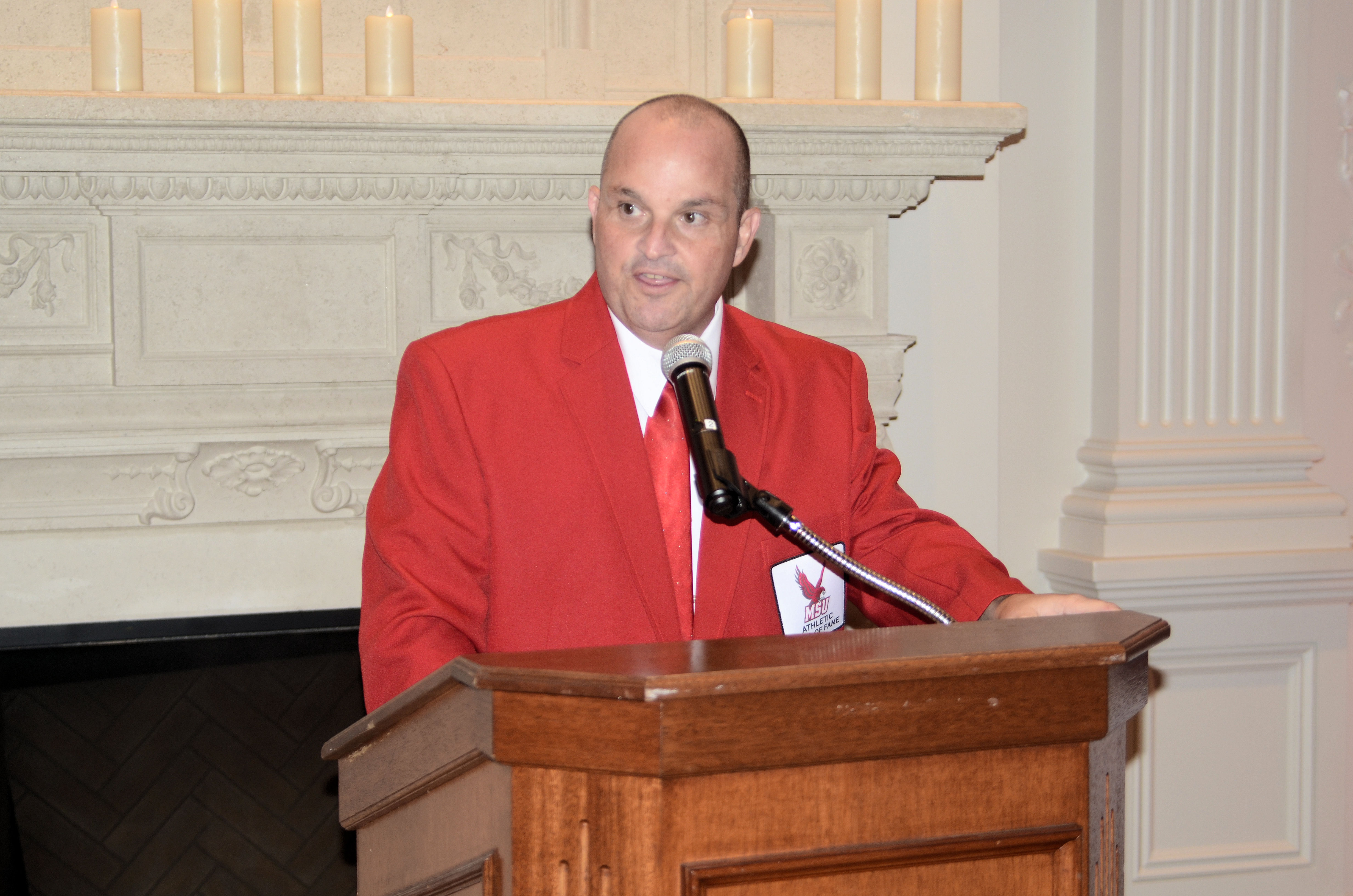 Scala speaks after winning the 25-year award from the College Sports Information Directors of America (COSIDA). Photo courtesy of Michael Scala