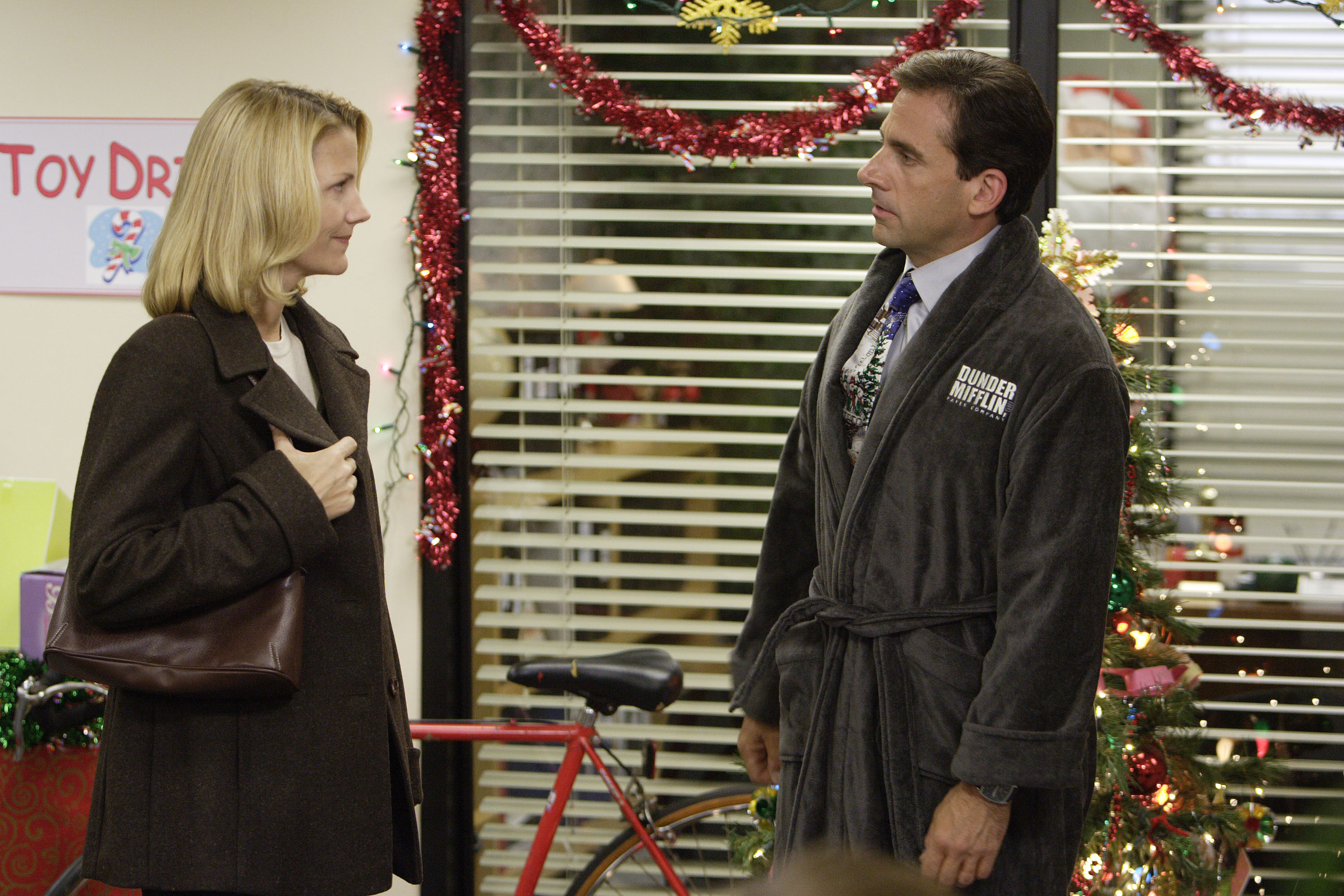 After sending Carol (Nancy Carell) a Christmas card of her and her children photoshopped with him on a ski mountain, she breaks up with Michael (Steve Carell) in "A Benihana Christmas."