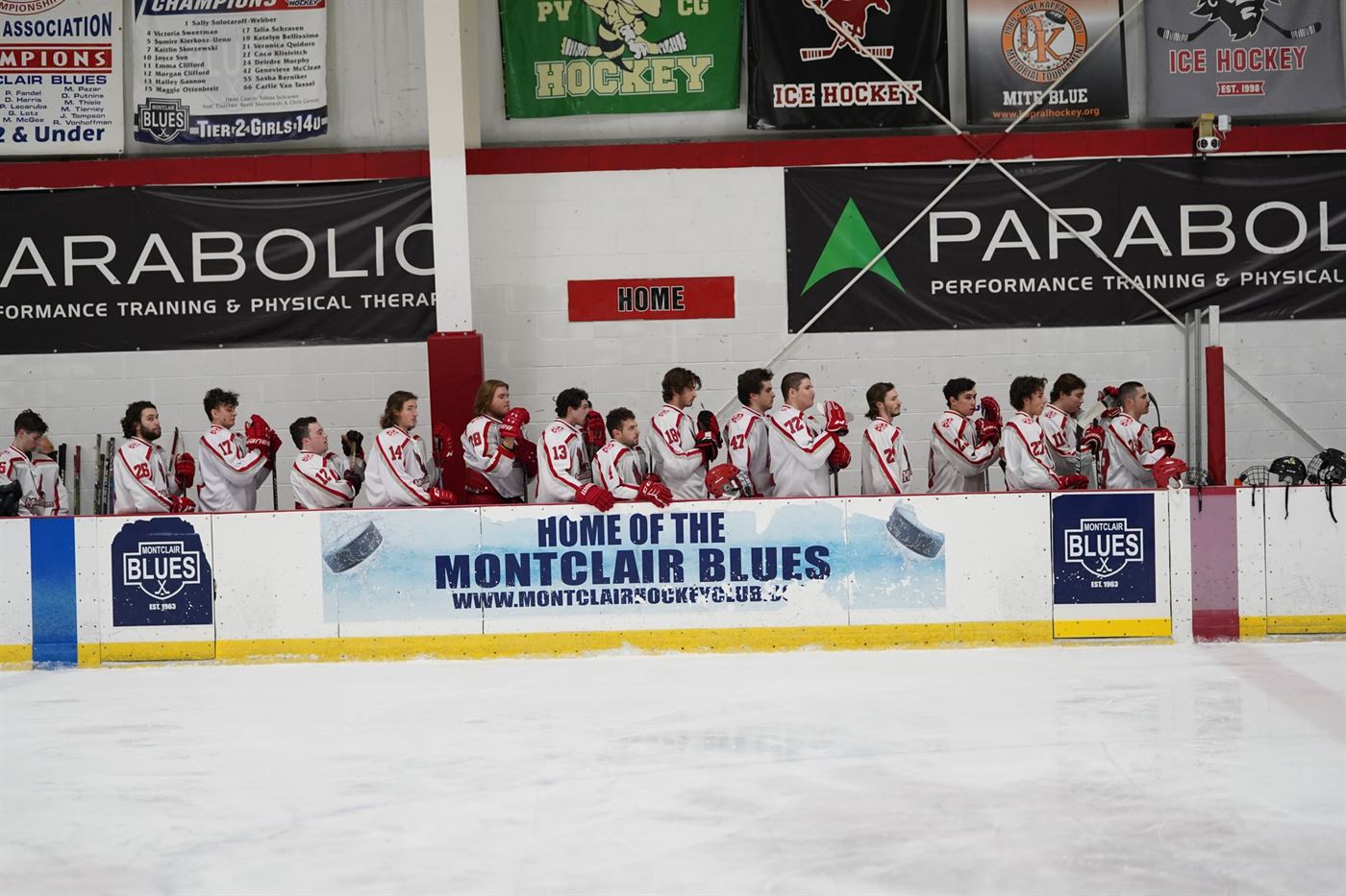 The Montclair State men's ice hockey team stands for the national anthem. Photo courtesy of David Venezia