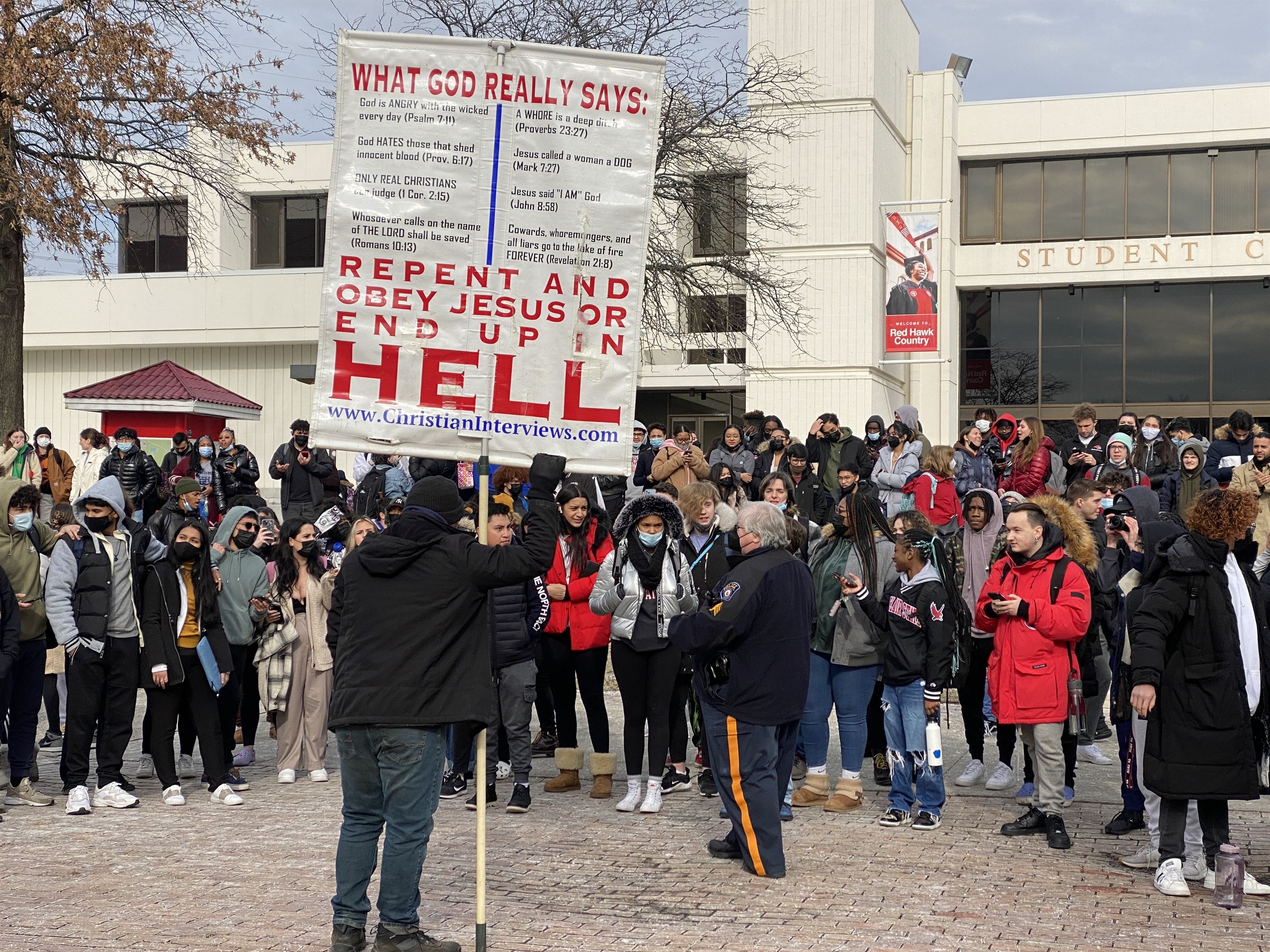 A crowd of students gathered outside the Student Center watching the protest. Michael Callejas | The Montclarion