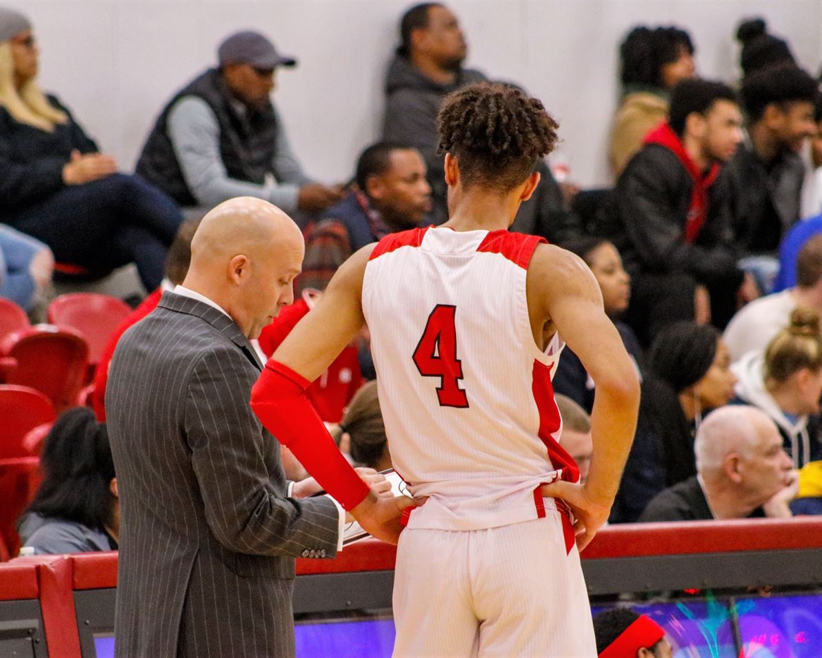 Graduate student Irving Callender IV (shown here with Potts) has grown a close relationship with the third-year head coach. Photo courtesy of Montclair State Athletics
