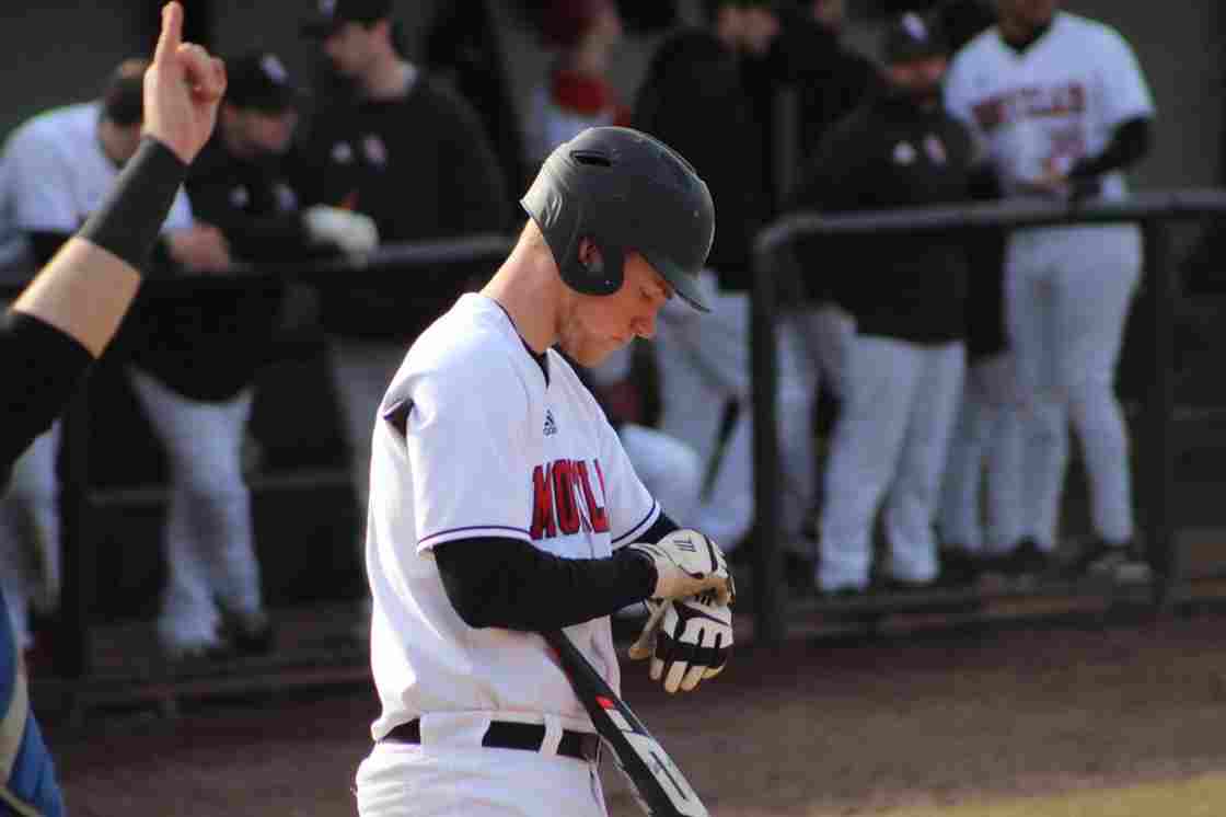 David tightens his batting gloves and gets ready to go to bat Andrew Ollwerther | The Montclarion