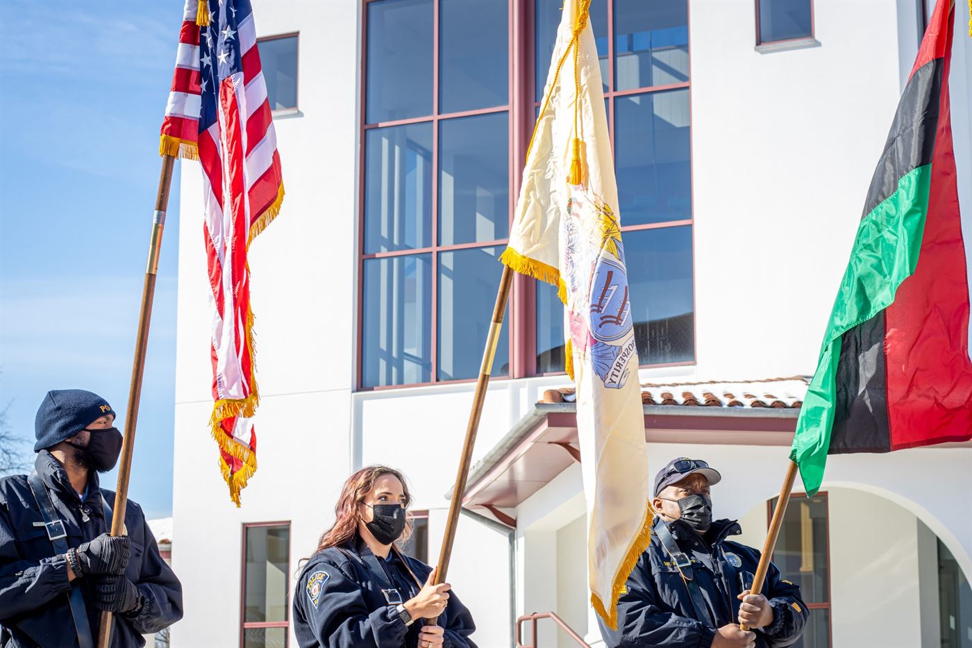 Members of the Montclair State Police Department holding flags for the Black History Parade Ceremony. John LaRosa | The Montclarion