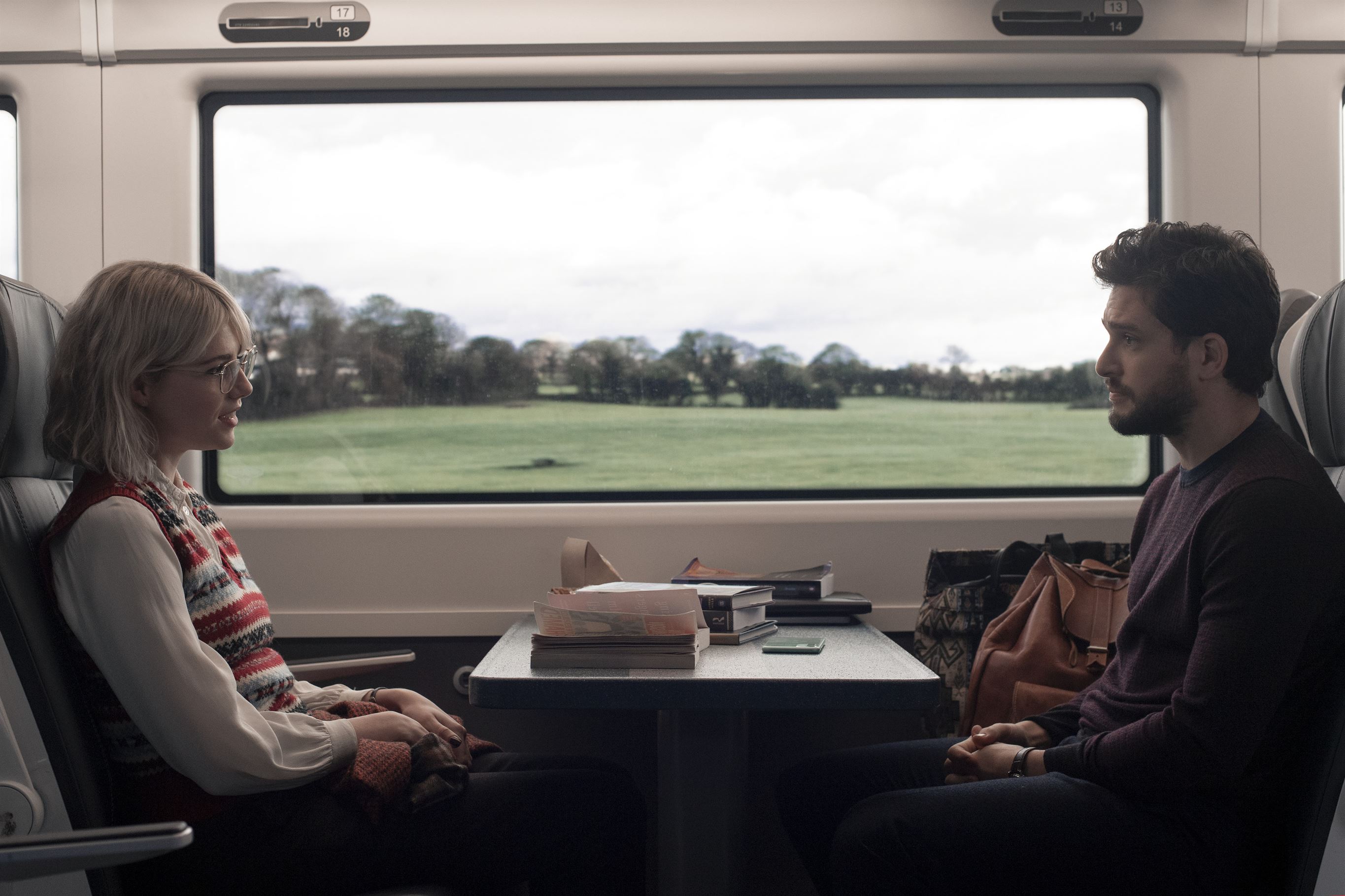 Paula and Michael meet on a train heading back to their childhood homes as a result of a two-week lockdown. Photo courtesy of Prime Video