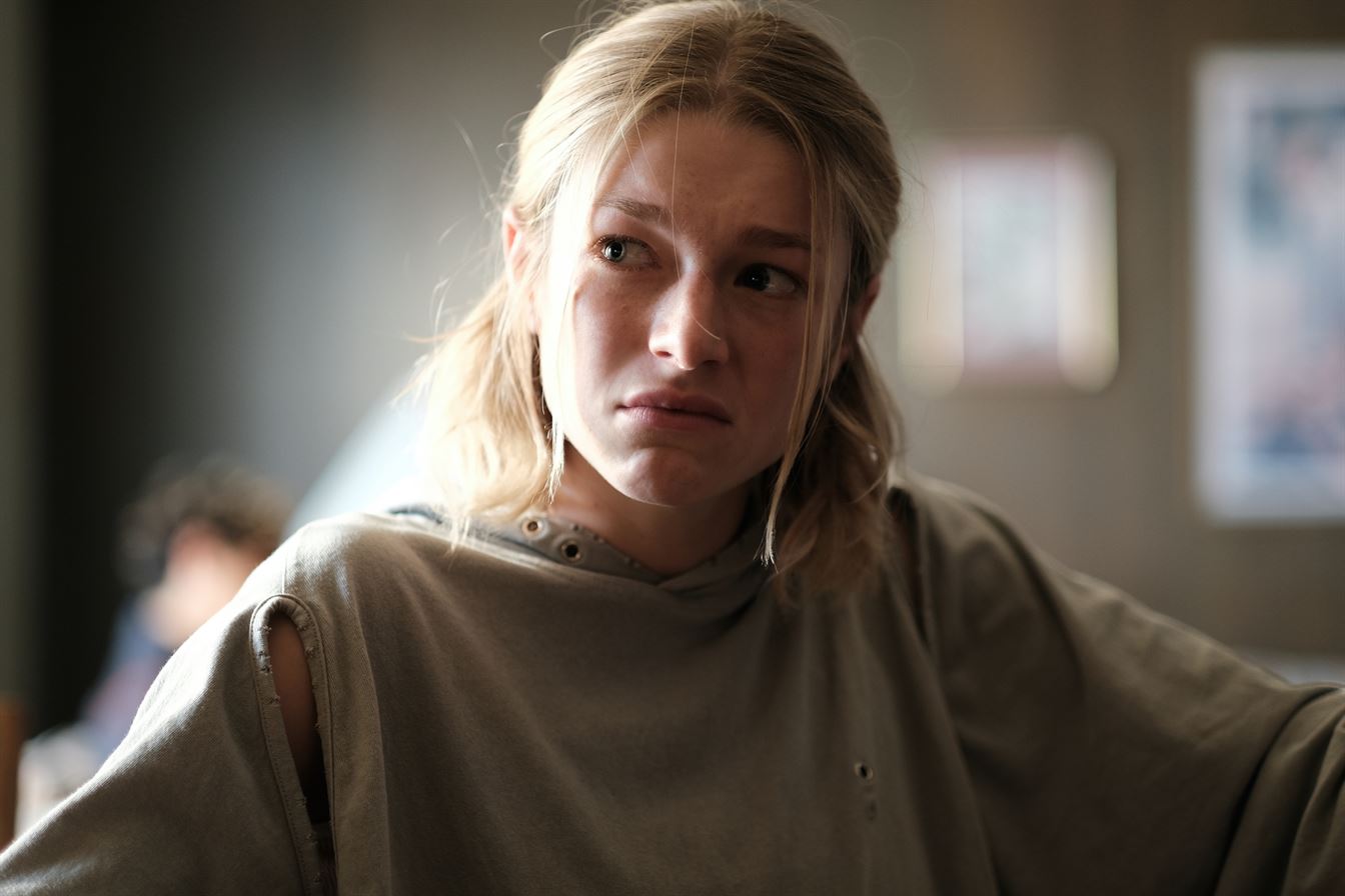 Jules (Hunter Schafer) sits in Rue's (Zendaya) kitchen, crying as Rue disowns her. Photo courtesy of HBO