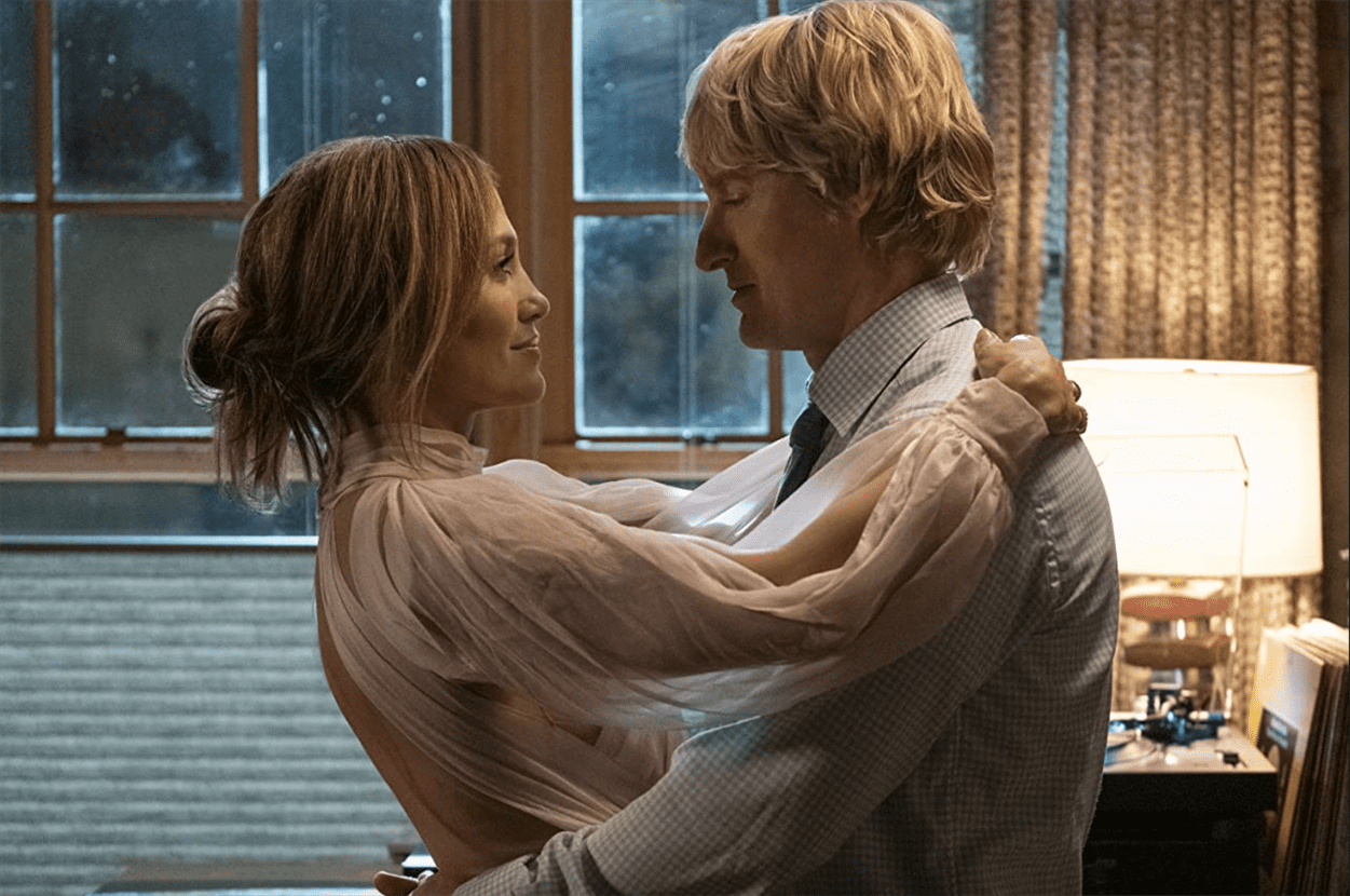 Charlie (Owen Wilson) and Kat (Jennifer Lopez) share an intimate moment dancing together. Photo courtesy of Universal Pictures