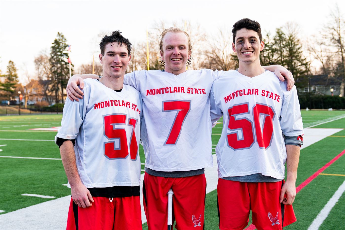 (left to right): Wilson Smith, Christian Boyle and Thomas Roper pose for a photo after a victory against Misericordia on March 16th. Chris Krusberg | The Montclarion