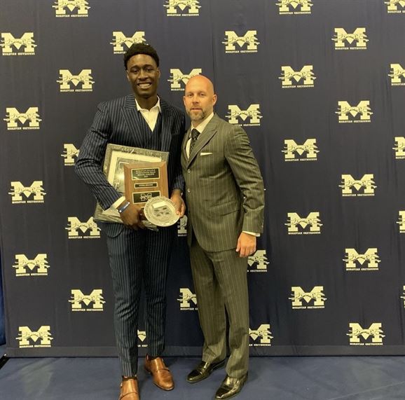 O'Neil Holder poses with head coach of Montclair State University's basketball team Justin Potts. Photo Courtesy of O'Neil Holder