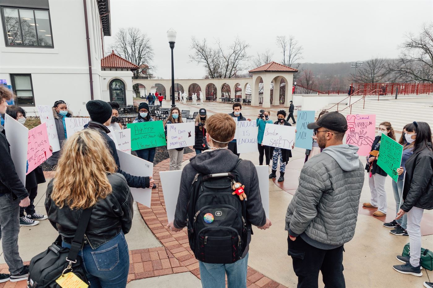 Sexual Assault Awareness Protesters circled outside of Susan A. Cole Hall. Karsten Englander | The Montclarion