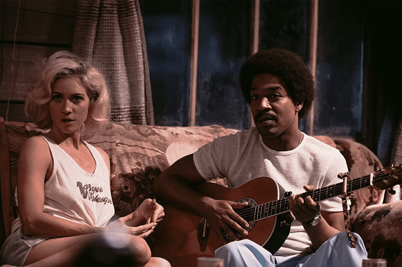 Bobby-Lynne (Brittany Snow) and Jackson (Kid Cudi) serenade the rest of the cast. Photo courtesy of A24