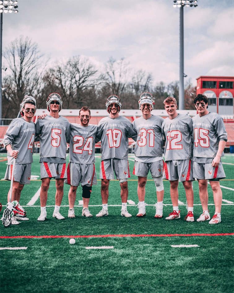 Mike (#5) and Tyler McCreery (middle) and their brotherly bond has also been crucial for the lacrosse team. Dan Dreisbach | The Montclarion