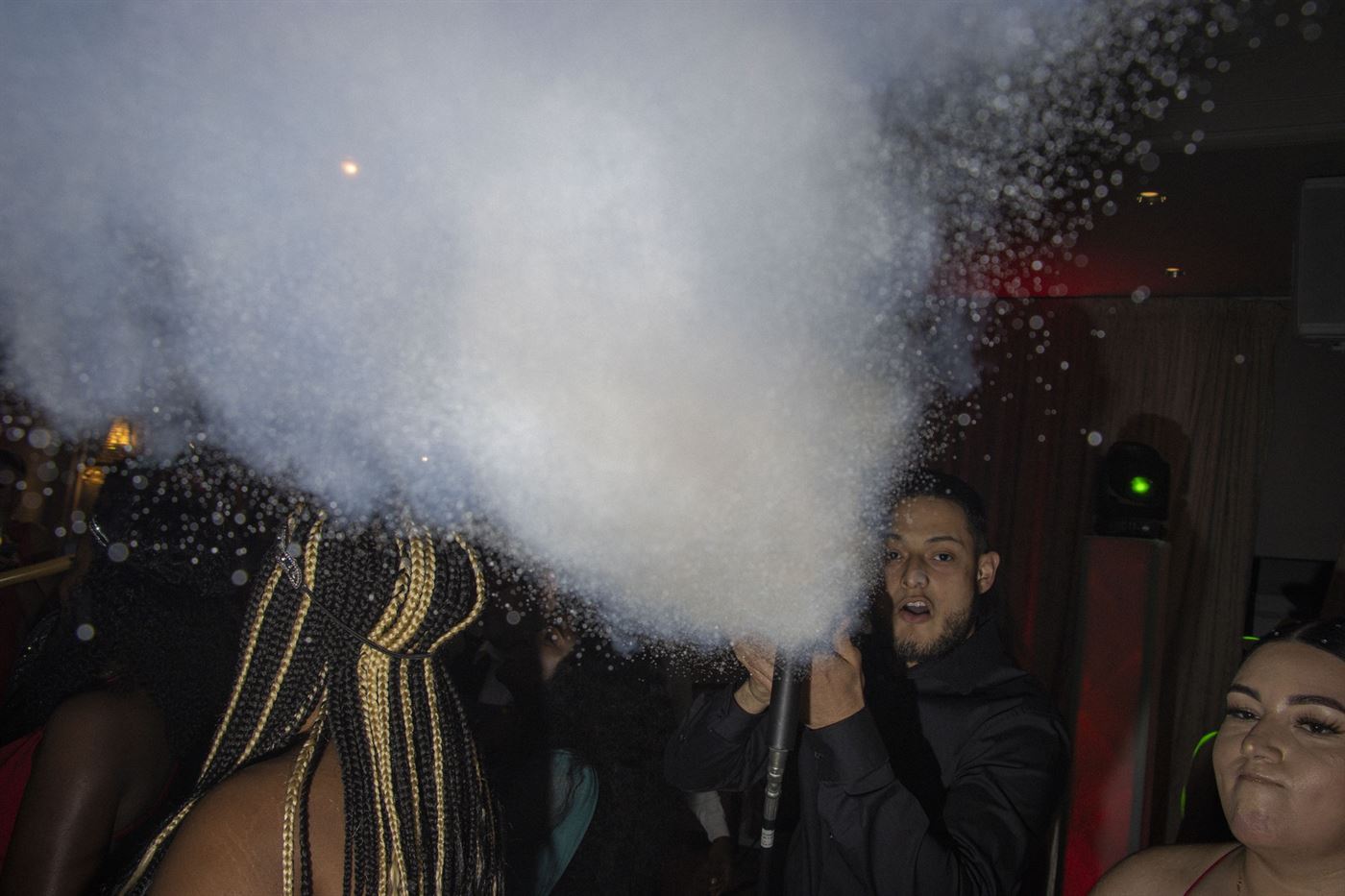 At the night's climax, the DJ came from behind his table and blasted the crowd with a CO2 canon while balloons were handed out as well. Julian Rigg | The Montclarion