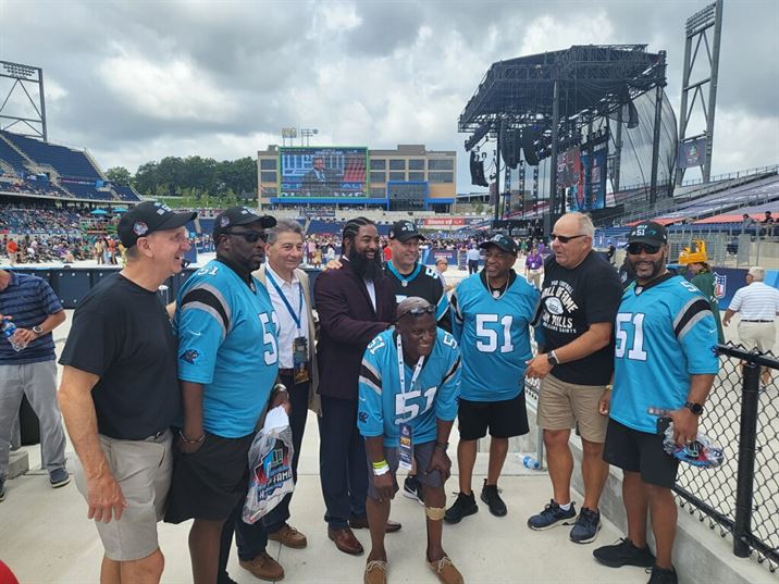 Head coach Rick Giancola, Sam Mills III, and some of Sam Mills' college teammates are in Canton to celebrate this major moment in school history. Photo courtesy of Stacy Gitlin