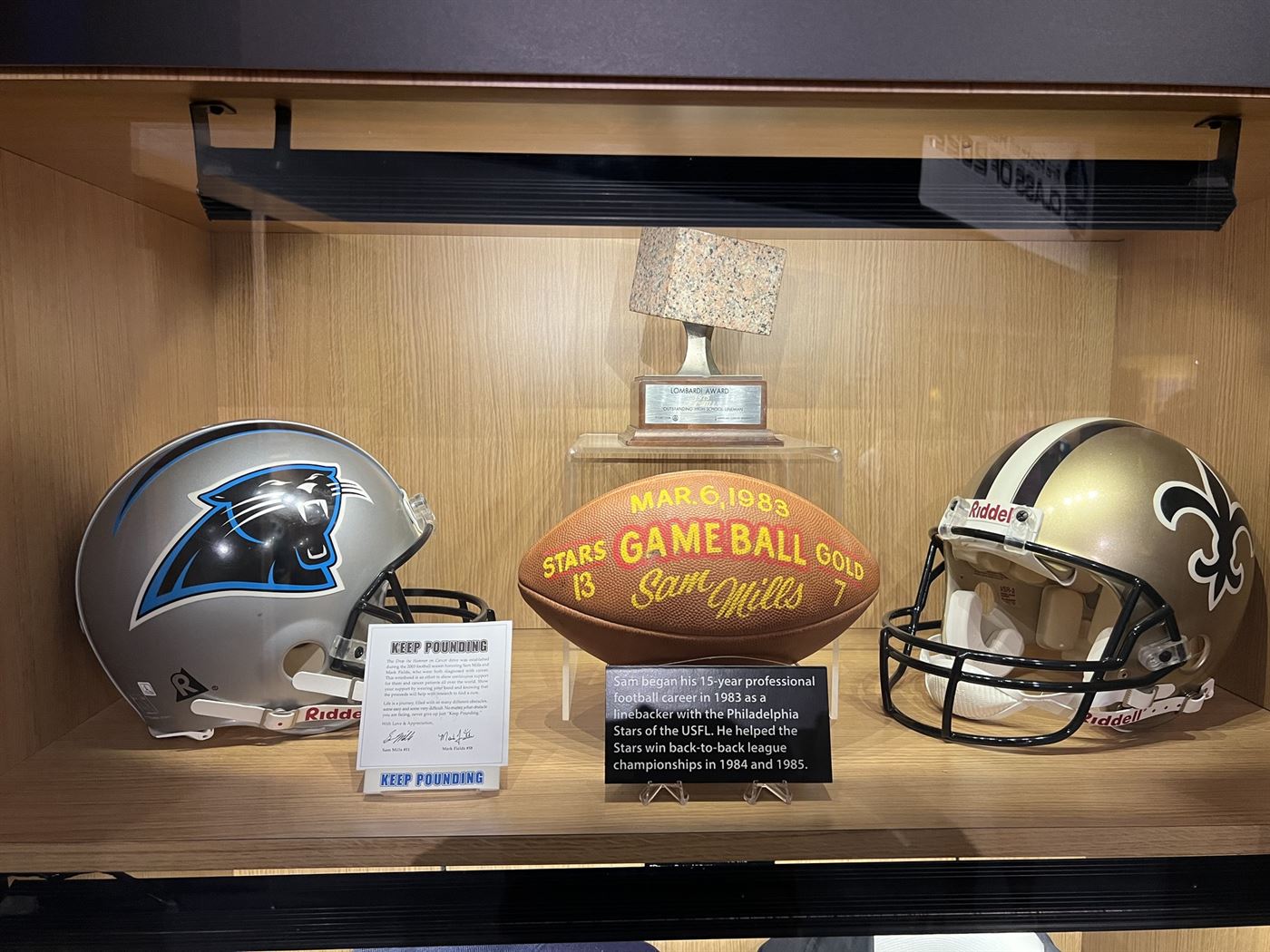 A few pieces of memorabilia found in the Pro Football Hall of Fame Museum from Sam Mills. Photo courtesy of Matt Orth