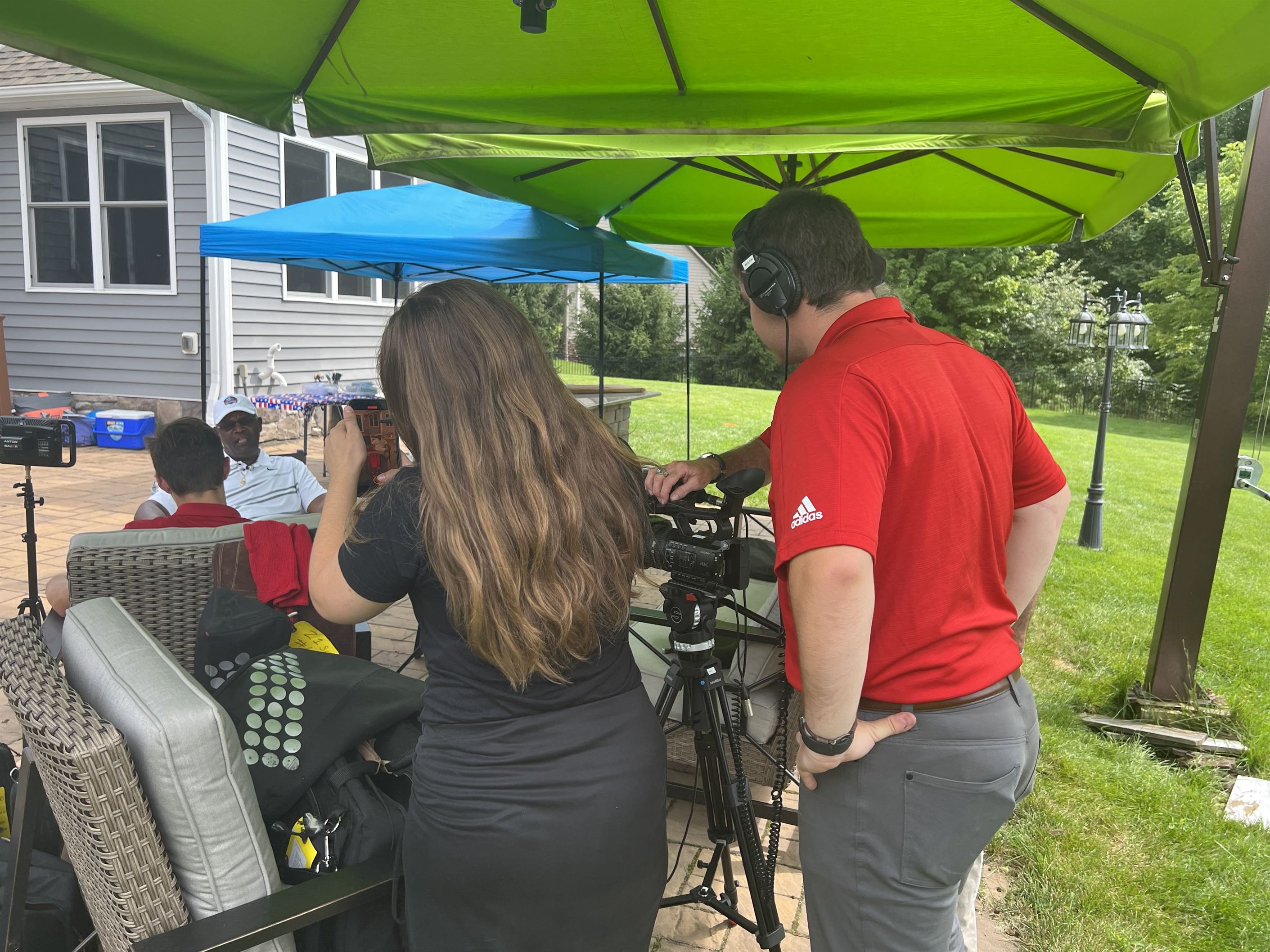 Jason Naccarella and Gianna Daginis shoot an interview outside of a BBQ further south in Ohio. Photo courtesy of Matt Orth.