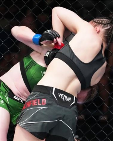 Blanchfield submitting Aldrich in the second round with a standing guillotine choke.