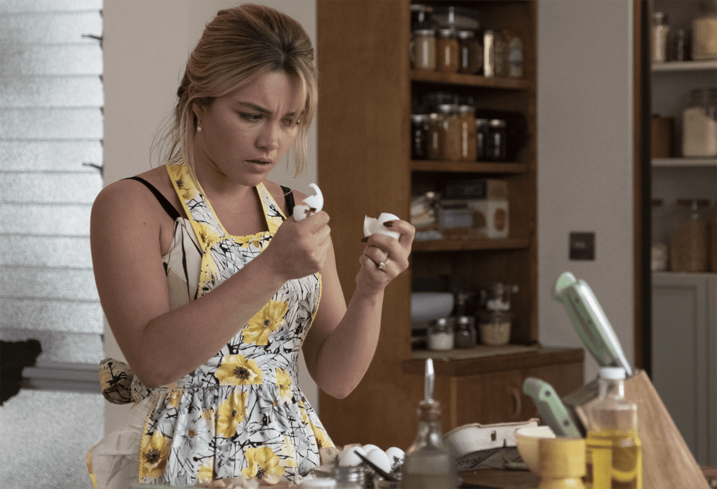 Alice (Florence Pugh) notices something wrong with the eggs.