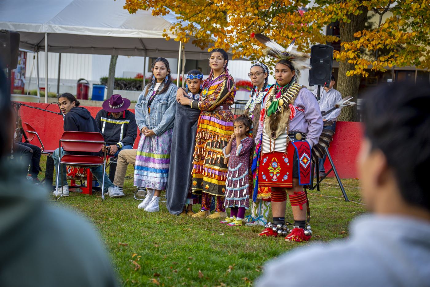 The Red Blanket dancers and drummer listens to people's questions at the end of the ceremony. Lynise Olivacce | The Montclarion