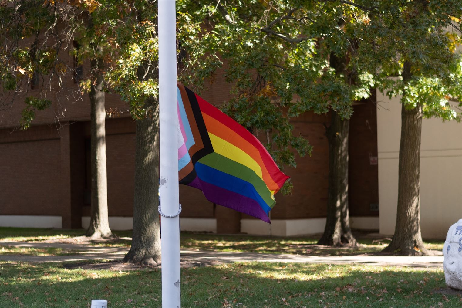 The LGBT+ Flag waves in the wind before being raised. Anna Mccabe | The Montclarion