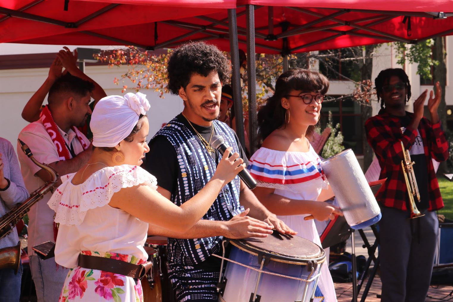 Isabel Adorno, Vic Ortiz, and Lornaa Morales performing as part of the Afro-Caribbean Ensemble from the Cali school of music.