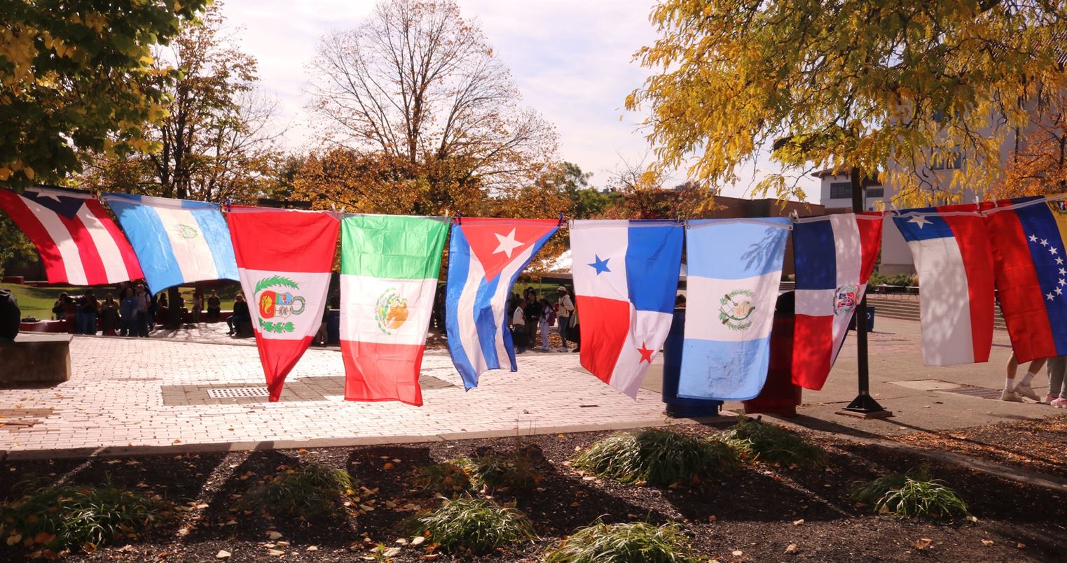 Flags of different Hispanic/ Latino countries are displayed in the student center quad for the Block Party.