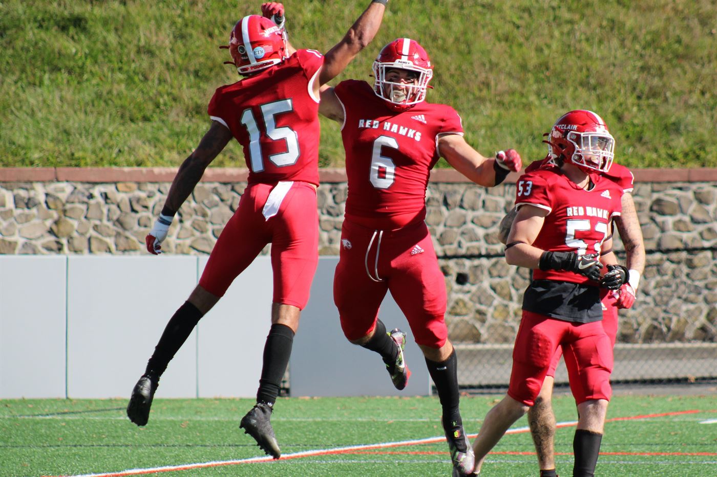 Dimitri Pali celebrates a sack, which attempted to revitalize the Red Hawks in this game. Emily Sznurkowski | The Montclarion
