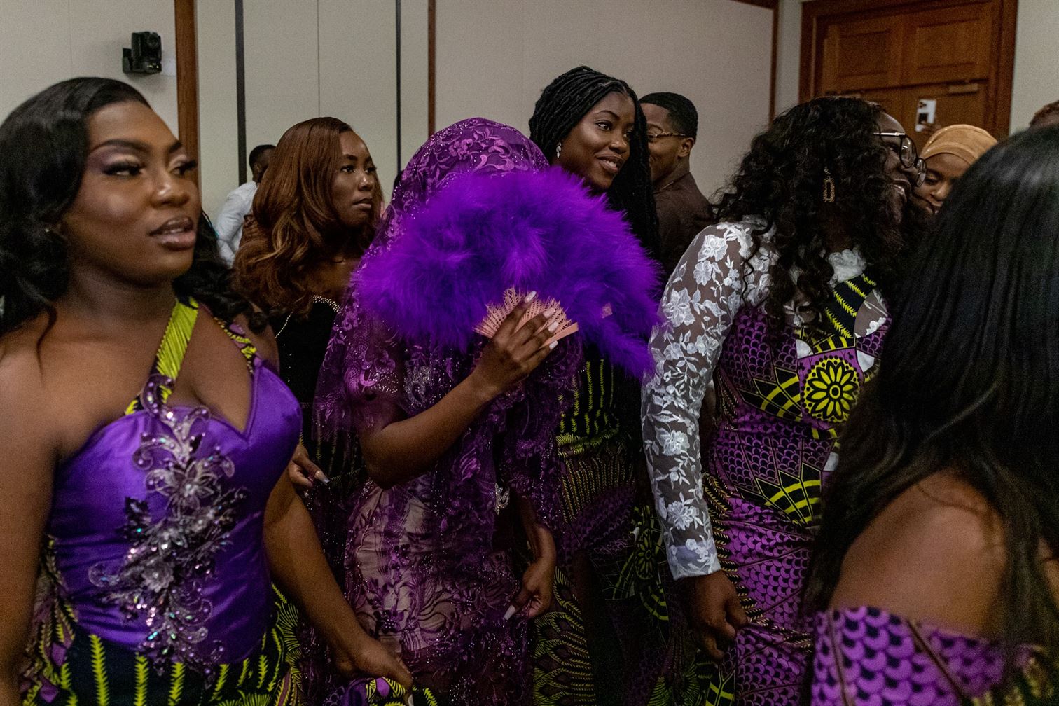 Mary Olatunji hides in the middle of the bridesmaids as they walk down the aisle. Karsten Englander | The Montclarion
