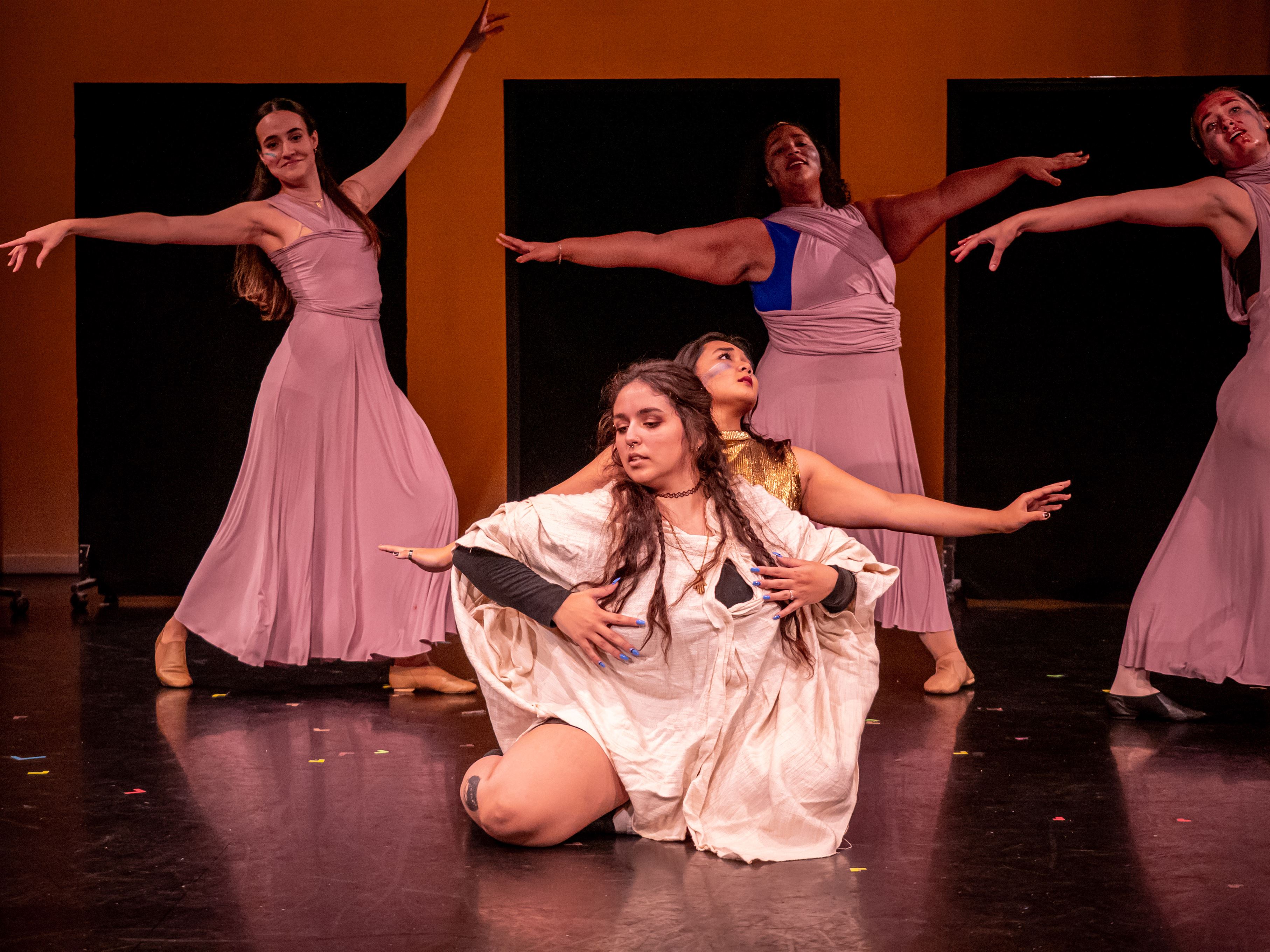 The cast performs their group Gandhi dance. Photos by John J. LaRosa