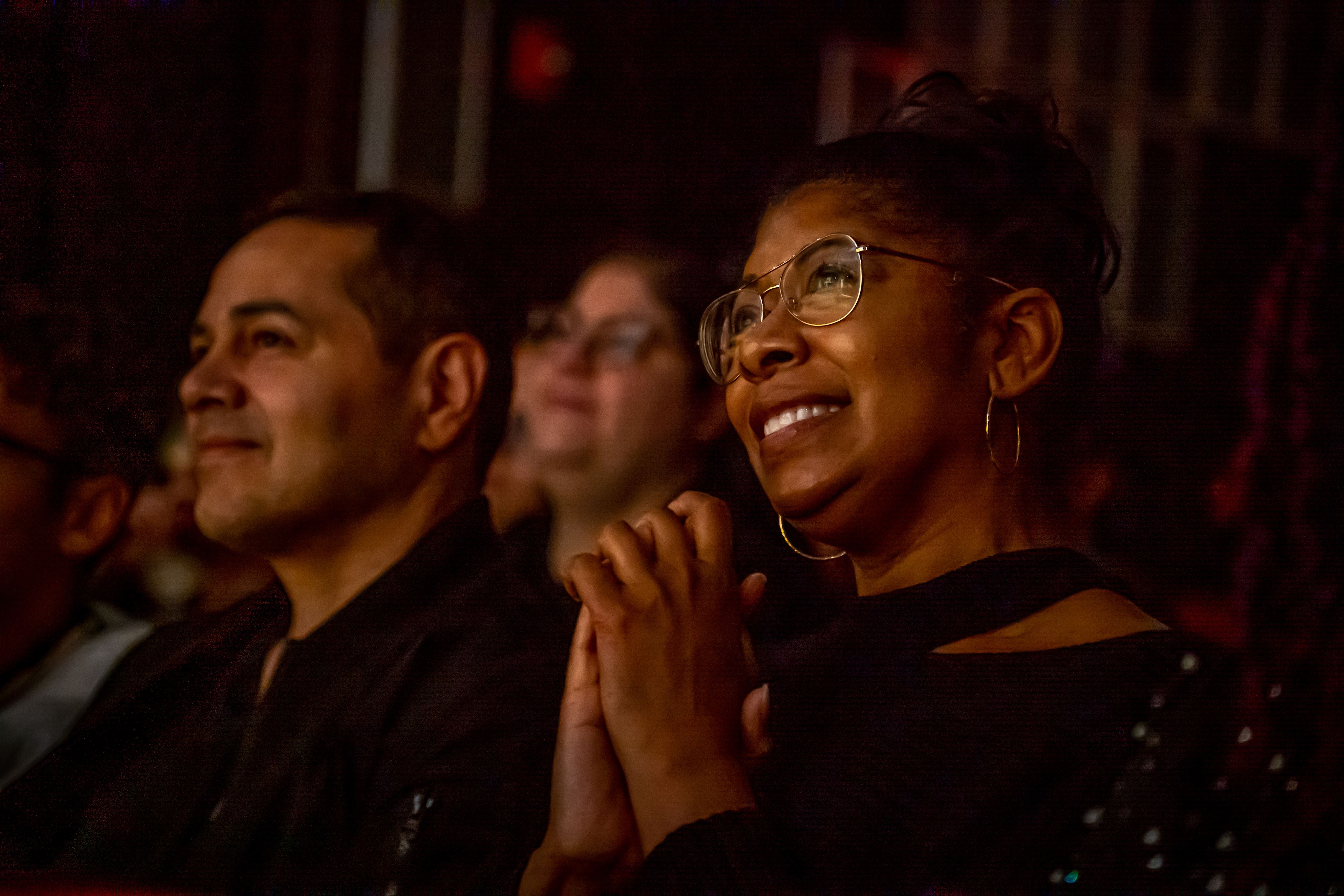 Audience members admire Myles Frost's words. Lynise Olivacce | The Montclarion