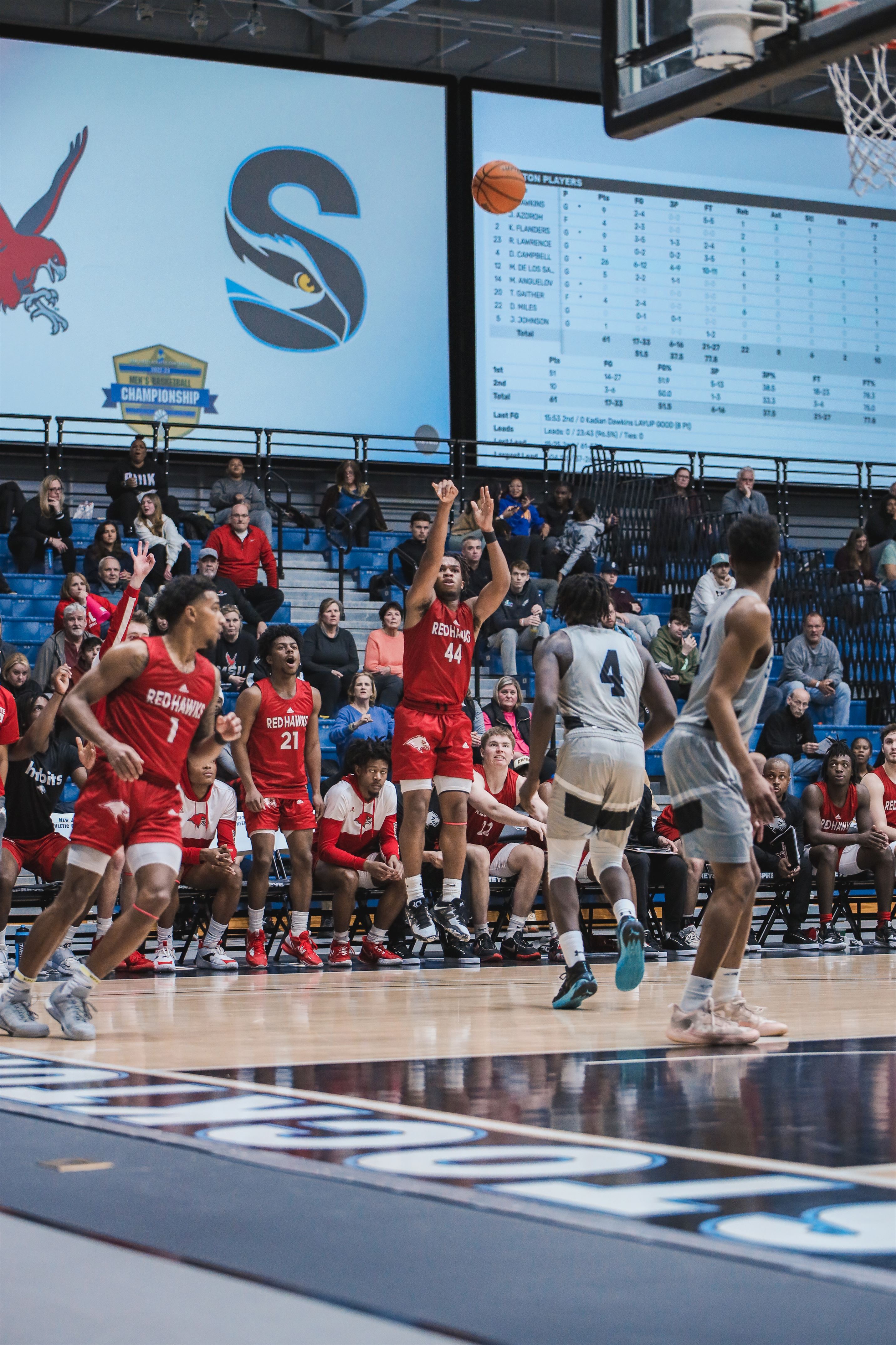 Samar Abdullah attempts a three pointer from the corner. Markell Robinson | The Montclarion