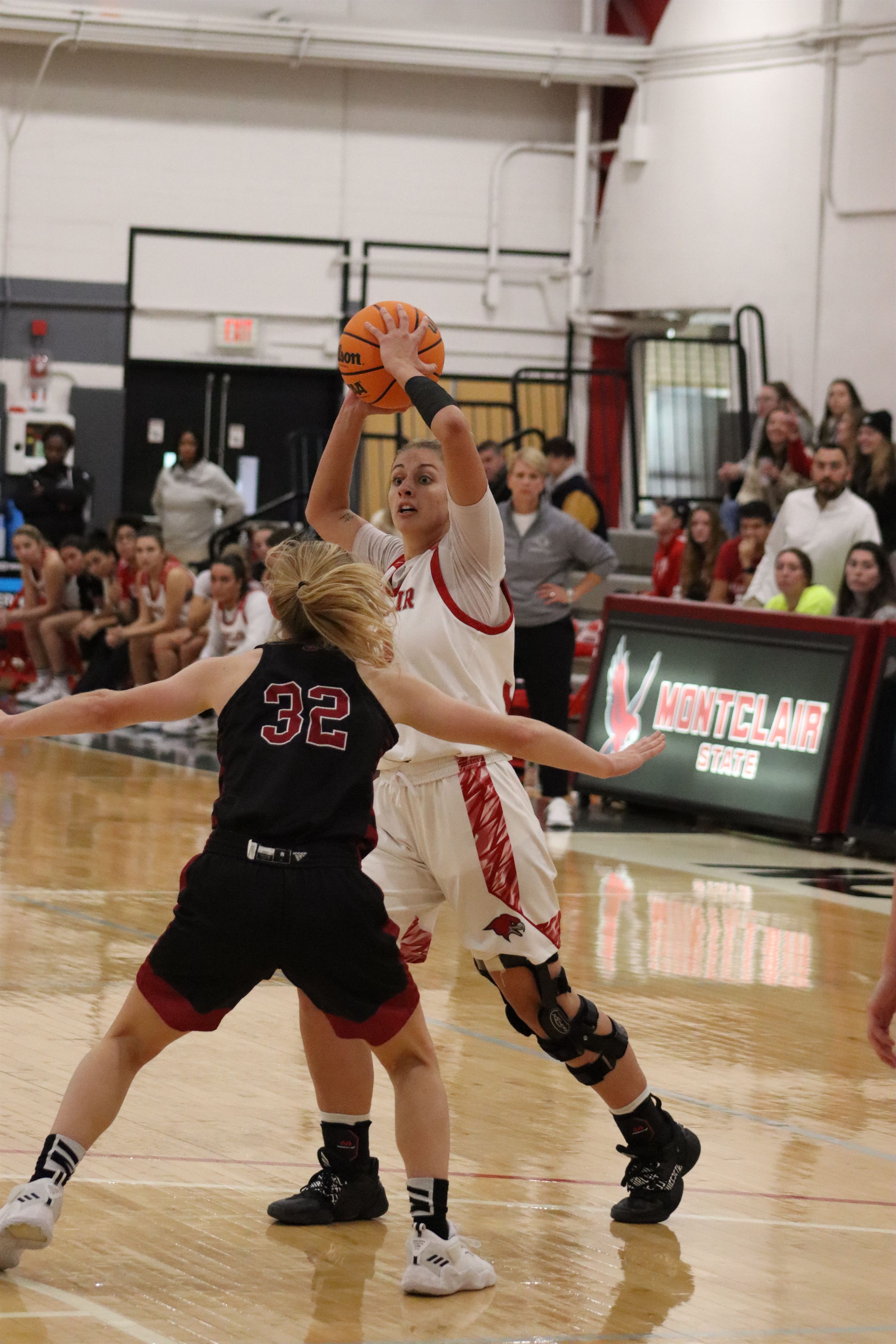 Teresa Wolak stands at the wing and looks to pass the ball. Trevor Giesberg | The Montclarion