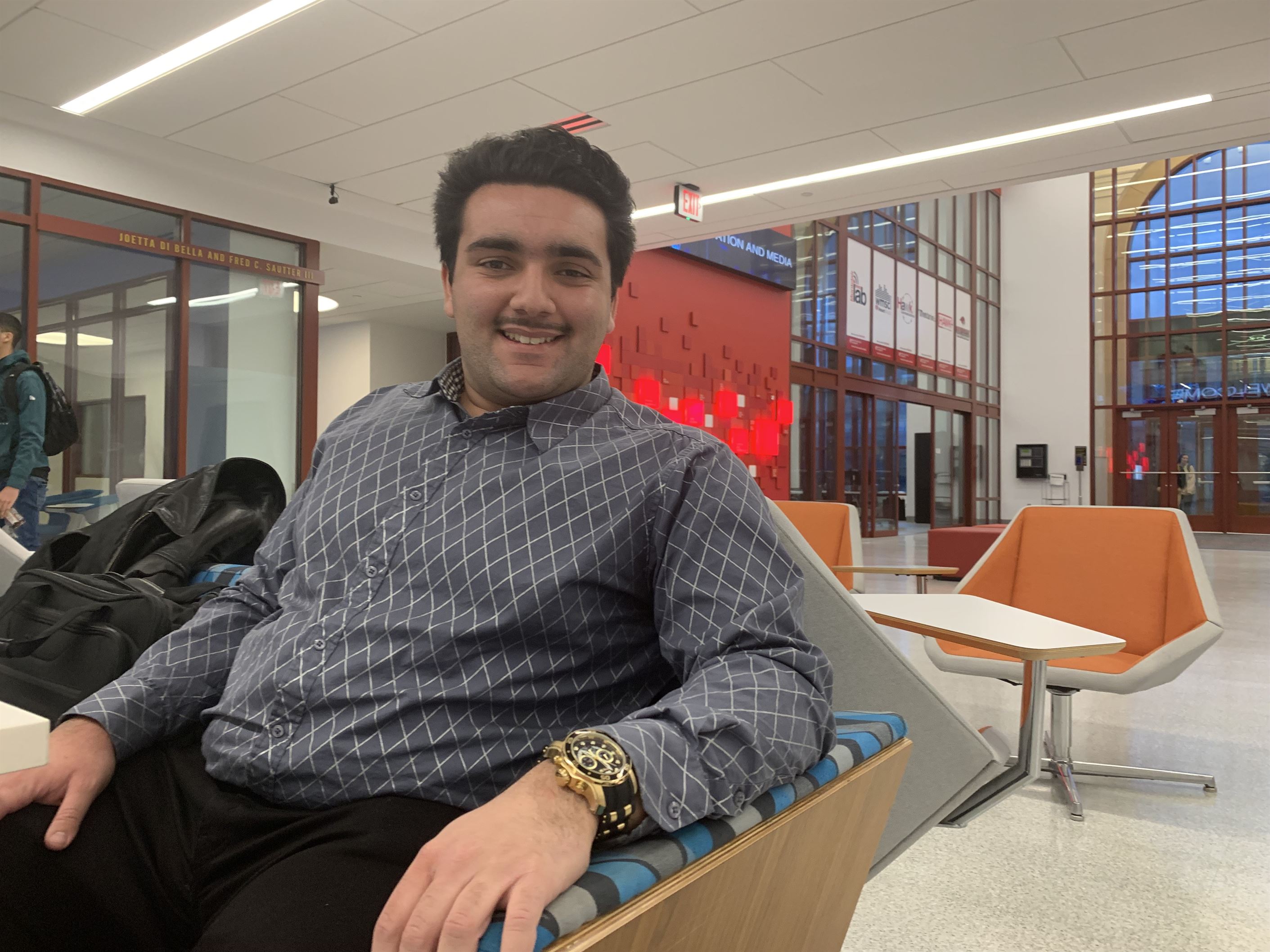 Bobby Dante, a senior television and digital media major, pays strict attention to the various options to buy or rent textbooks for his courses. Aidan Ivers | The Montclarion