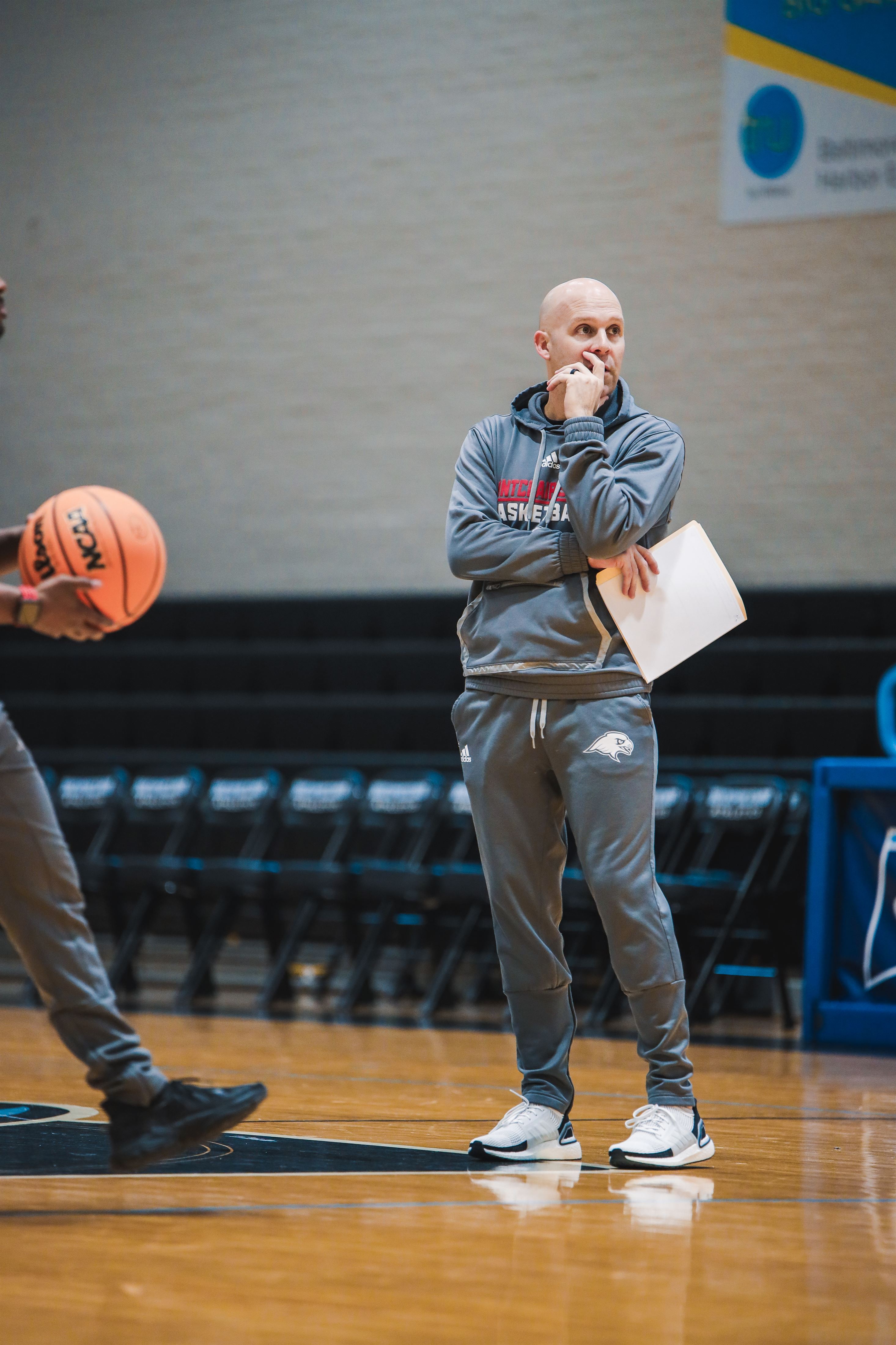 Head coach Justin Potts looks ahead at his team during a shootaround. Photo courtesy of Markell Robinson