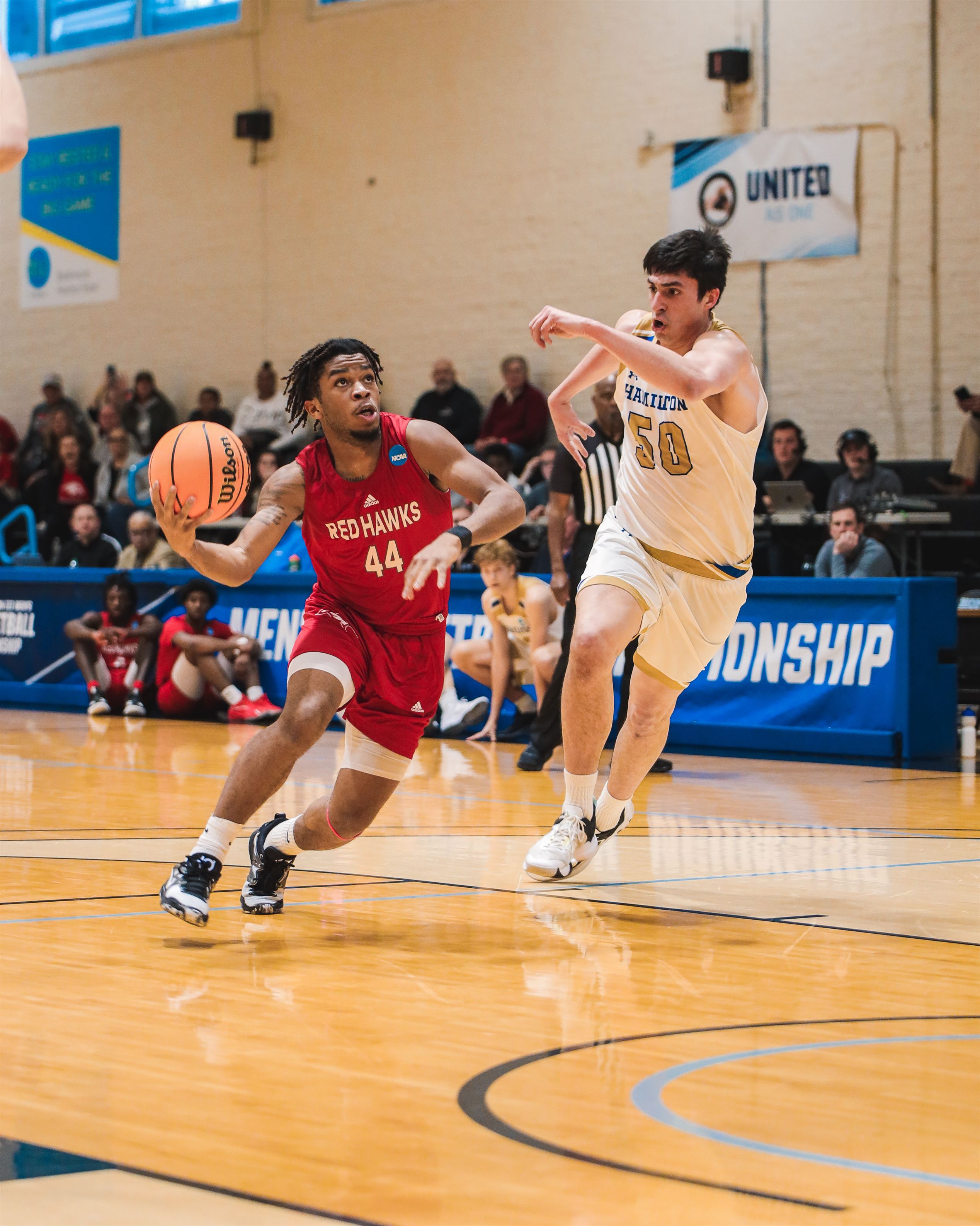 Freshman guard Samar Abdullah drives on a Hamilton defender. Photo courtesy of Markell Robinson