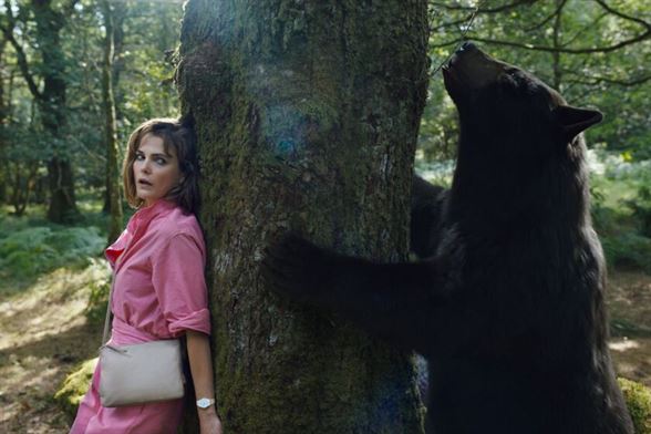 Sari (Keri Russell) hides from the Cocaine Bear.