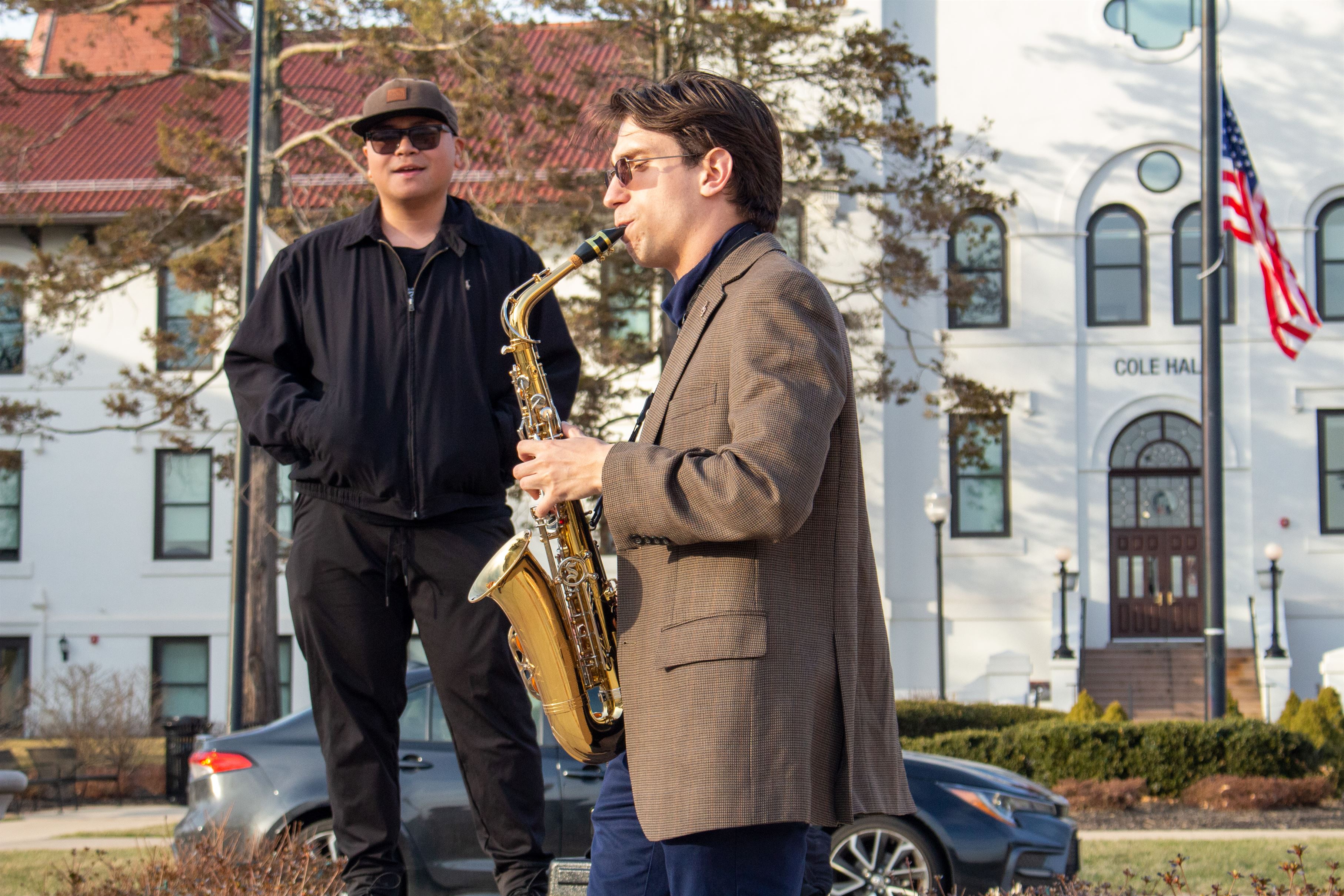 A student plays the saxophone in the Freeman-Russ Quad.
Sal DiMaggio | The Montclarion