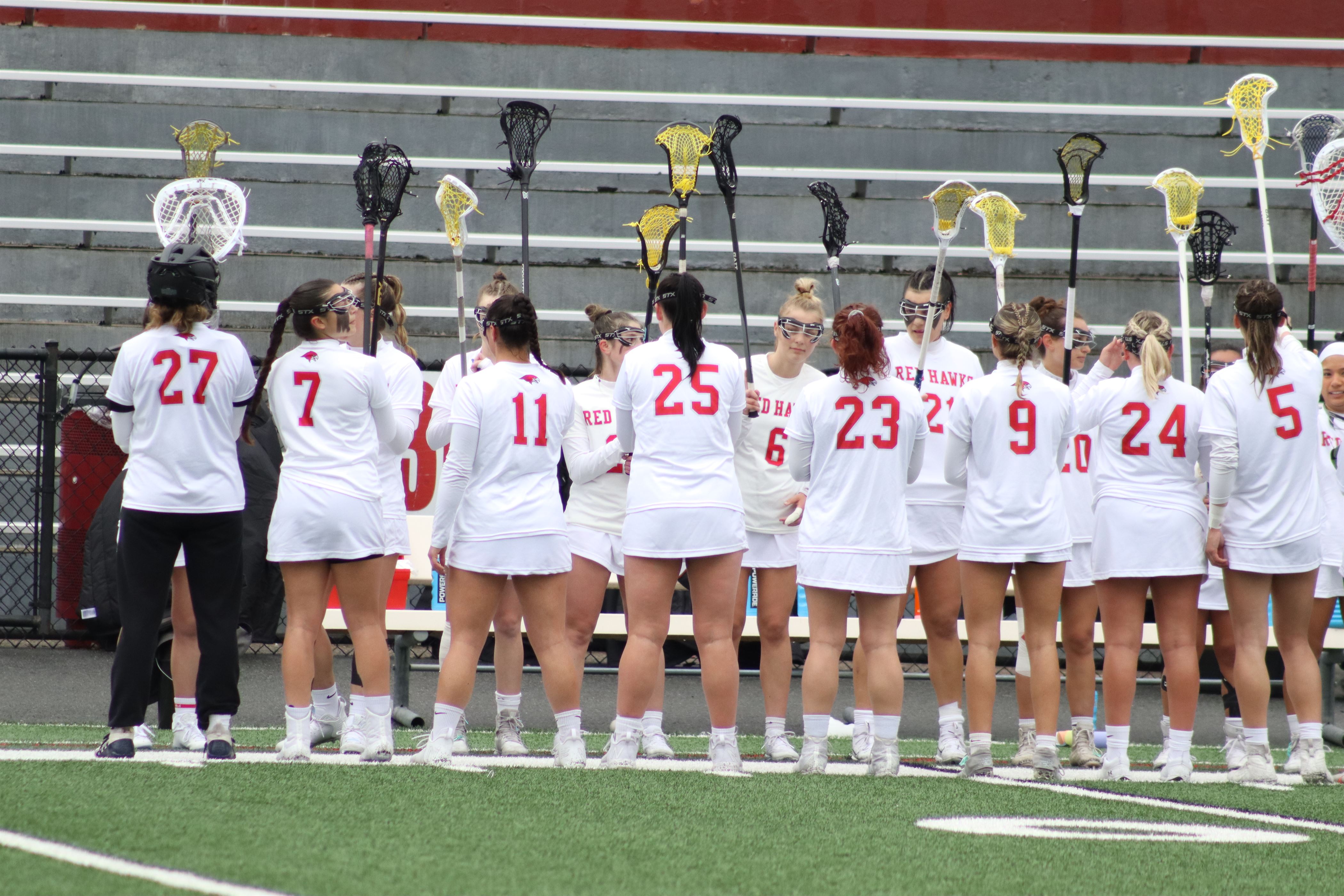 The women's lacrosse team put out their starting lineups before the game. Trevor Giesberg | The Montclarion