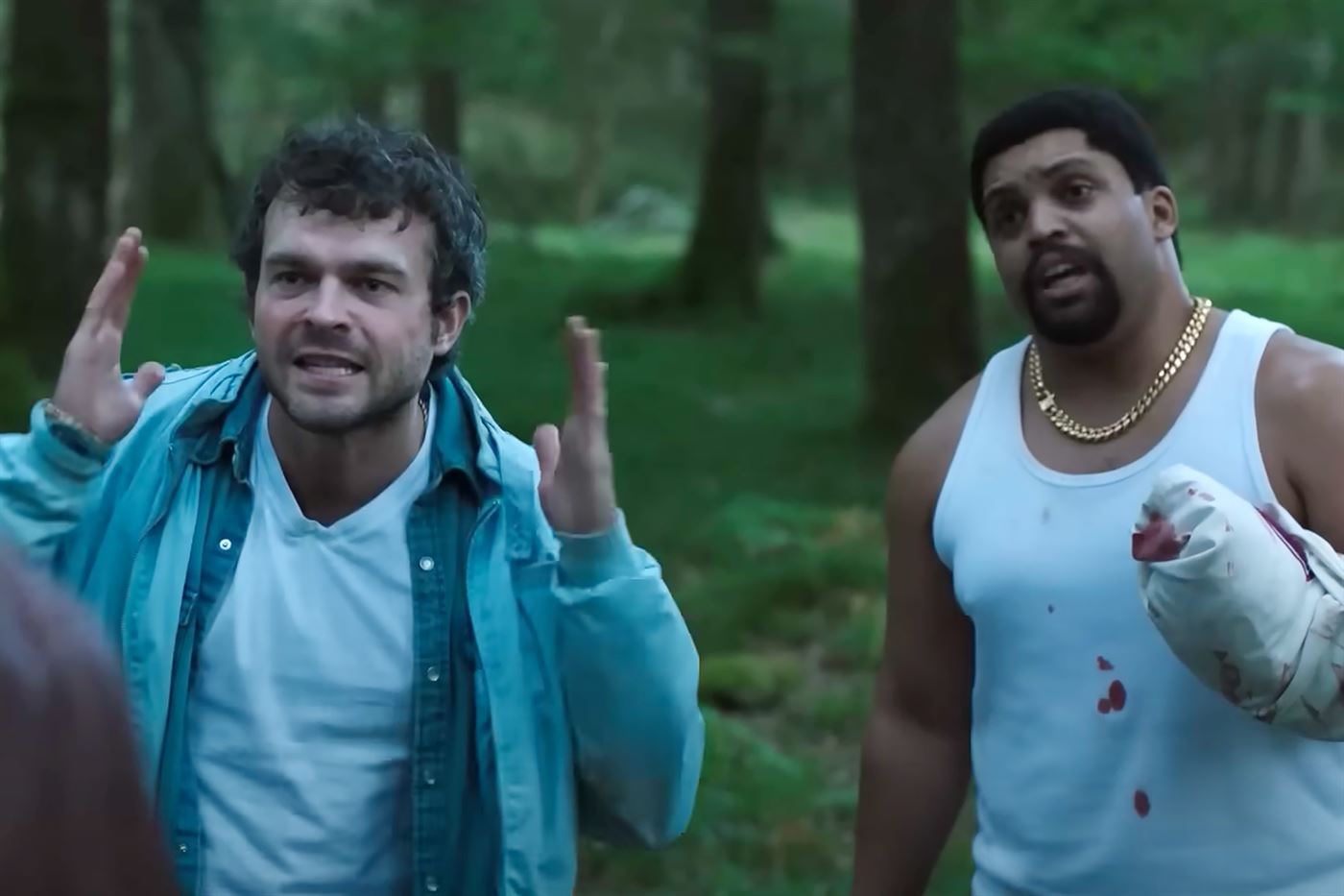 Eddie (played by Alden Ehrenreich, left) and Daveed (played by O'Shea Jackson, Jr., right) revel in the absurdity of their foe.