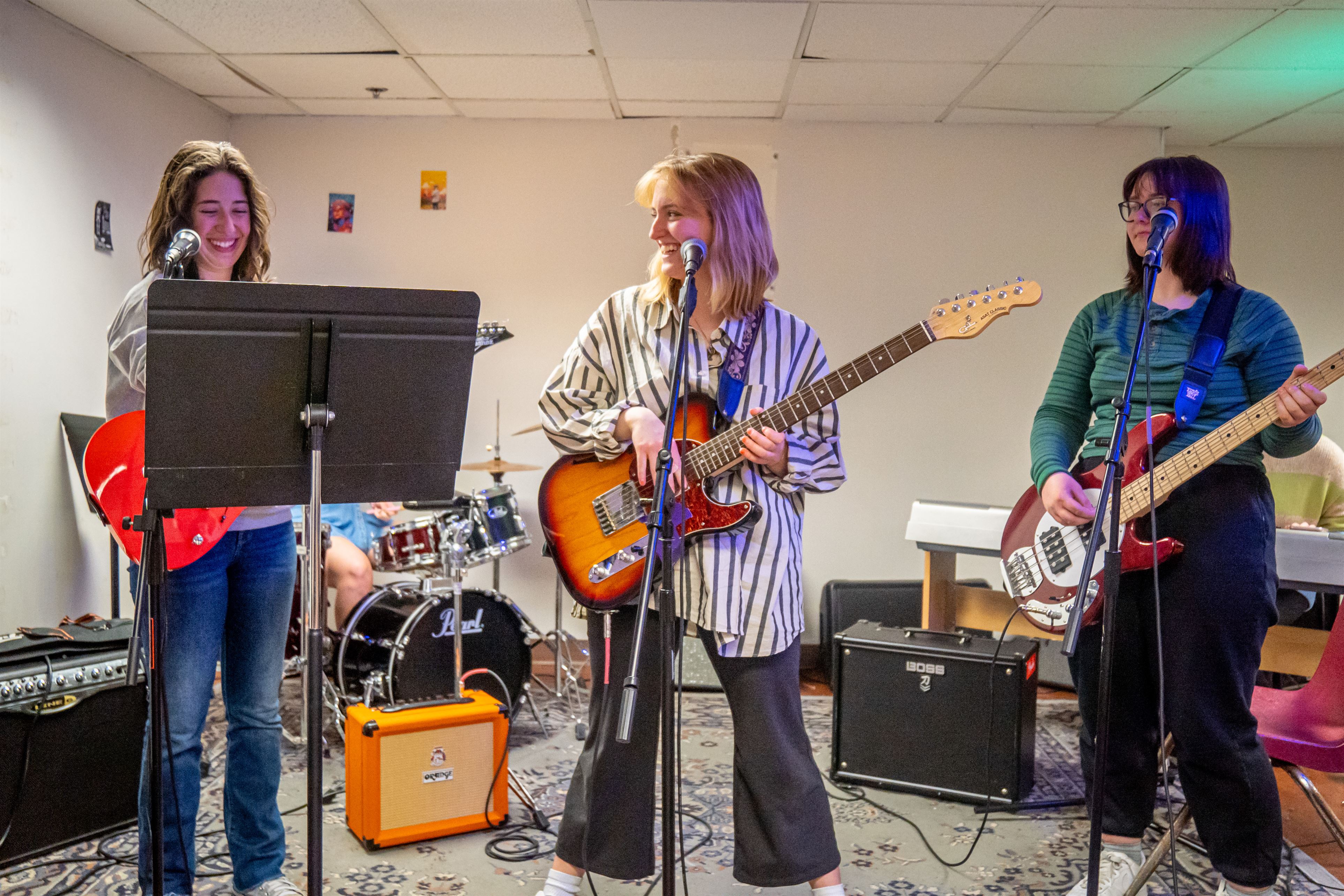 From left to right, Alexa Tabbacchino, a junior recording arts and production major, Melissa Hughes, a senior music education major, and Christine Tanko, a junior music education major, play their instruments together. 
Lynise Olivacce | The Montclarion