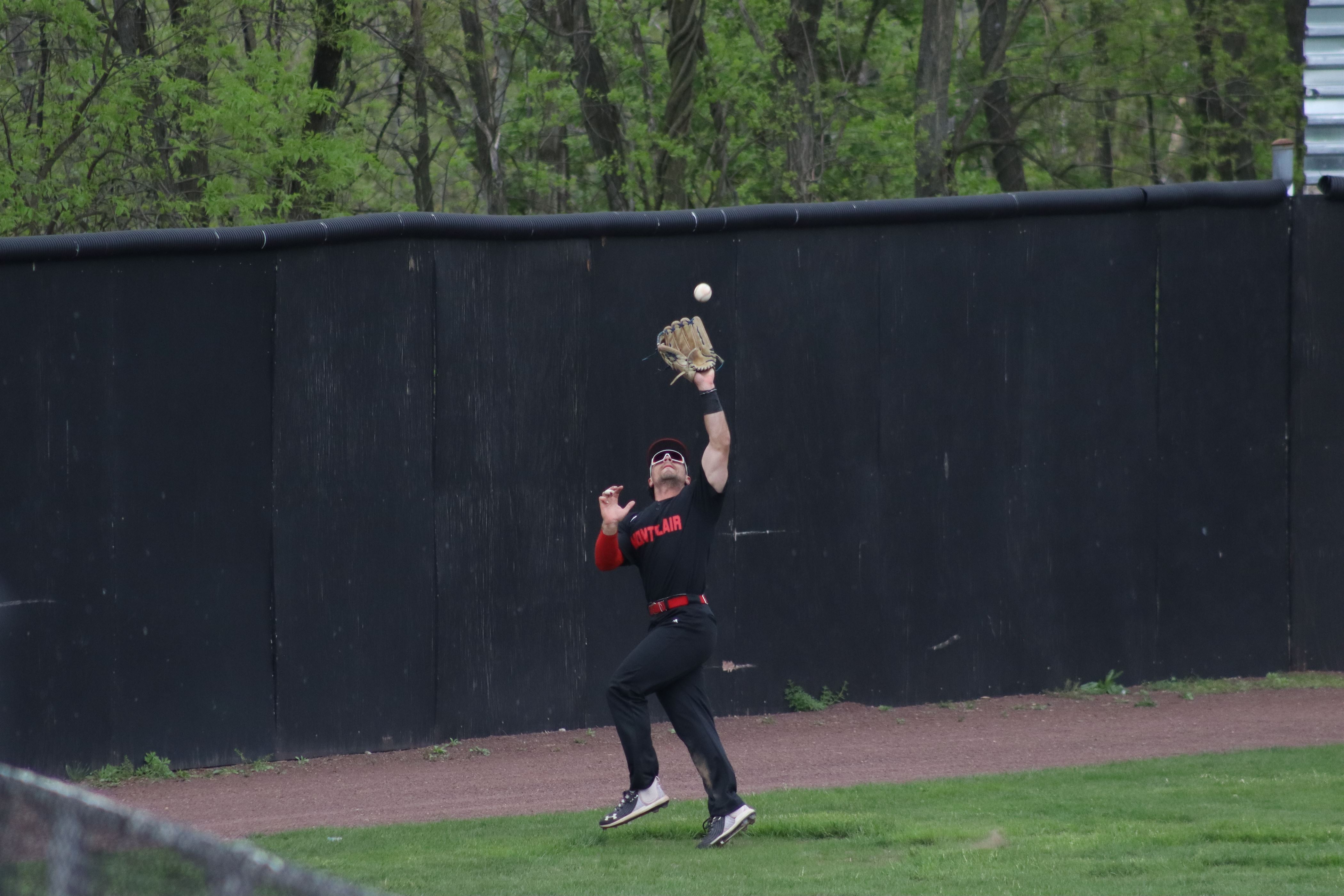 The Red Hawks make a great catch deep in the outfield. Trevor Giesberg | The Montclarion