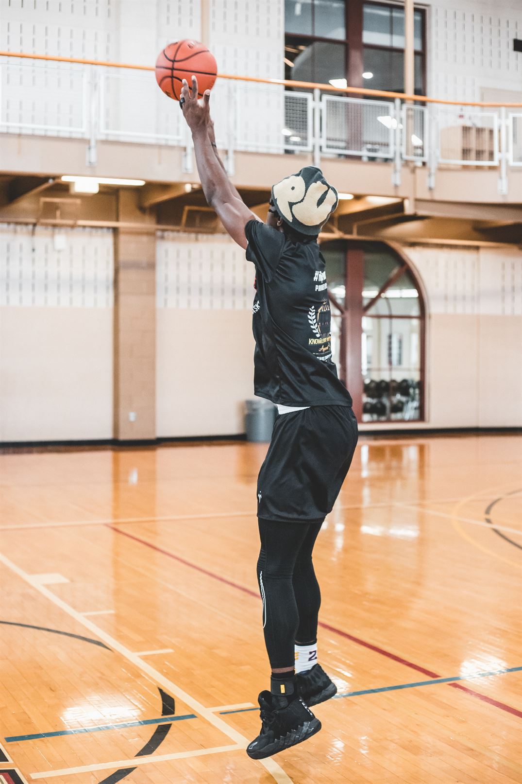 A player on the club basketball teams warms up before a game. Dan Dreisbach | The Montclarion