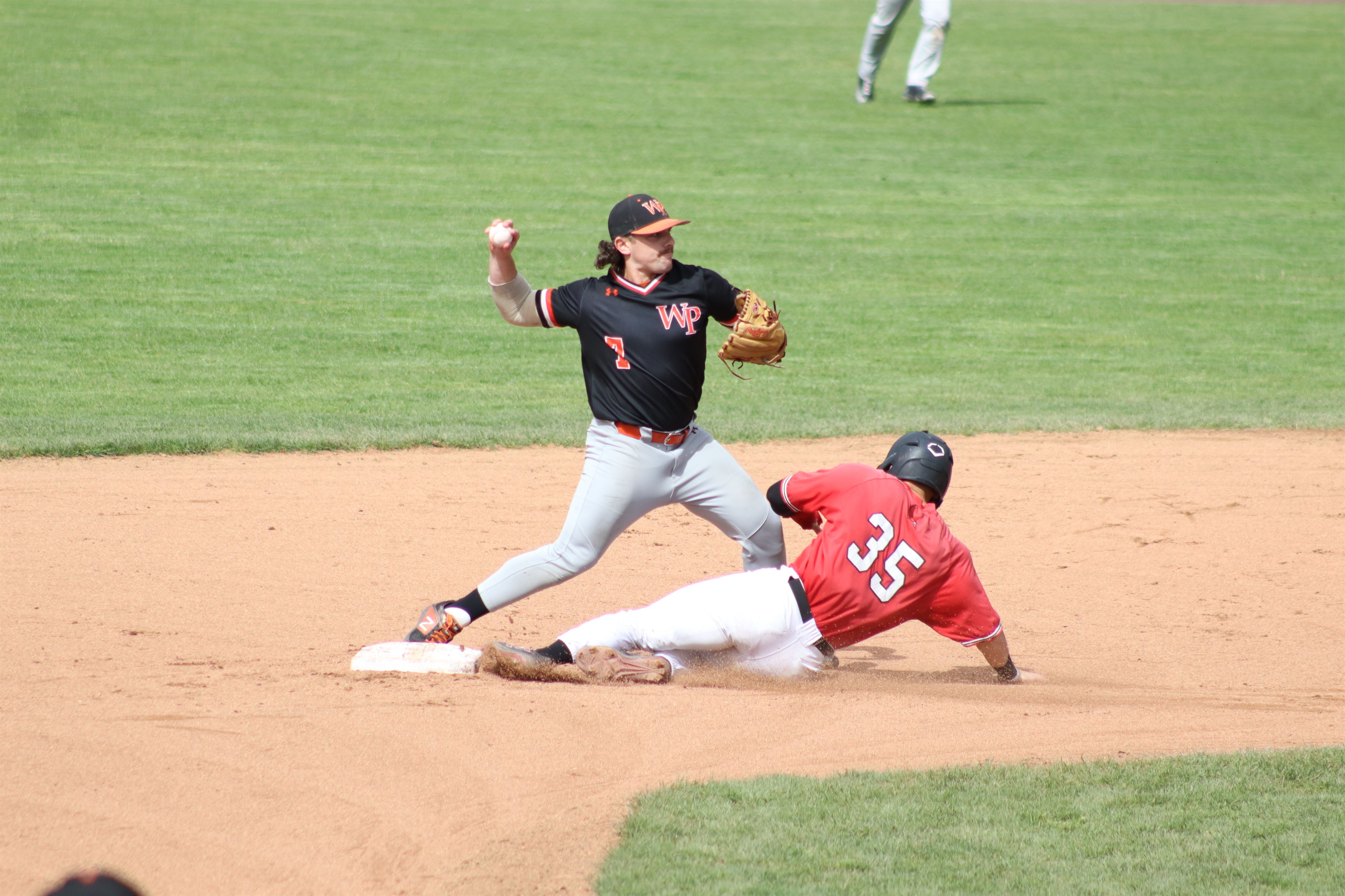 William Paterson University infielder turning the double play. Photo courtesy of Trevor Giesberg