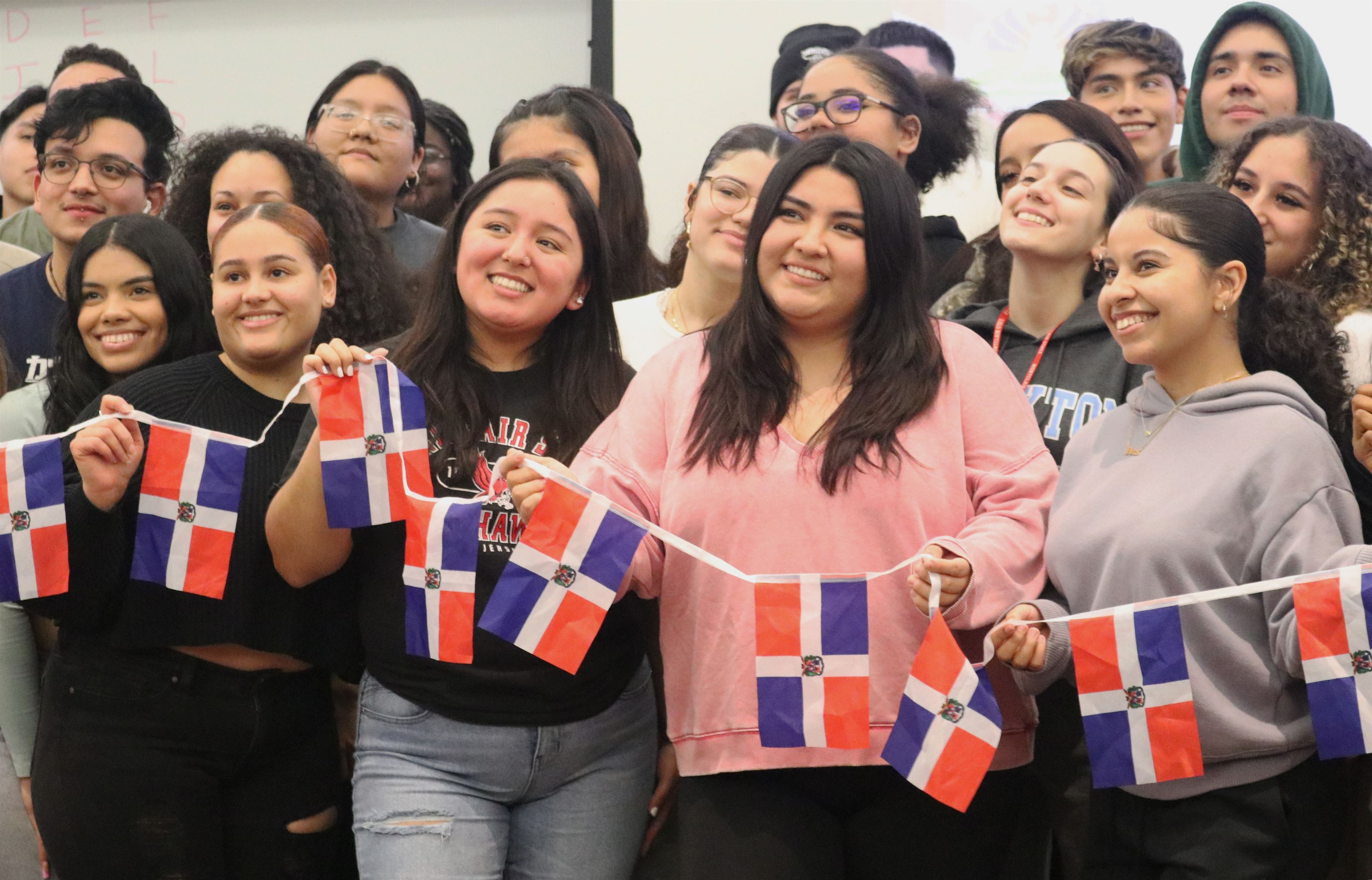 Members of the Latin America Student Organization (LASO) pose for a group photo during their general member meeting held in University Hall. Darian Mozo | The Montclarion