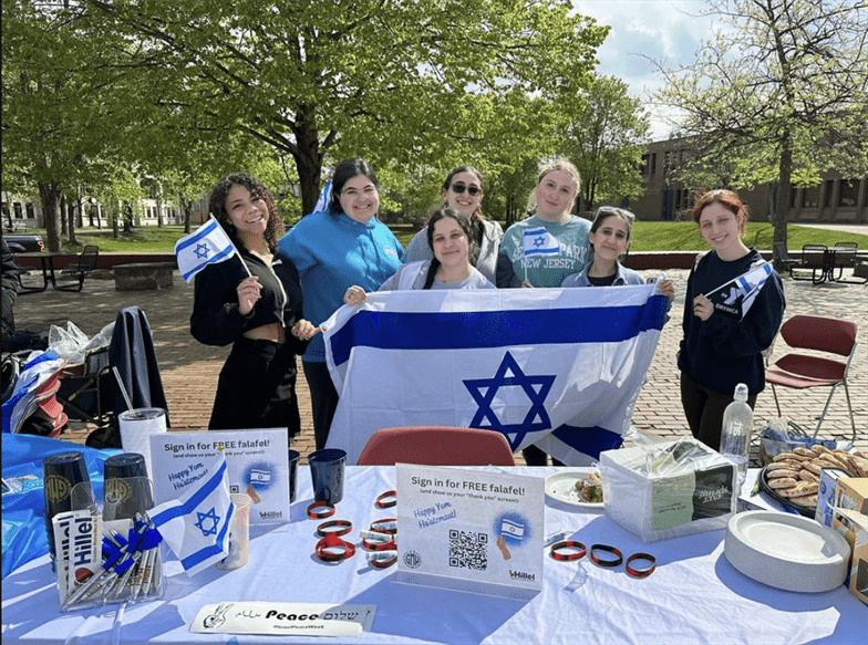 Montclair State's Hillel table show pride in group photo