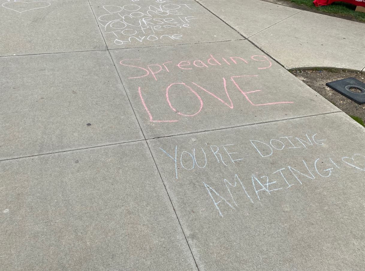At the Kick It! At the DC event, students wrote positive affirmations in chalk on the sidewalk.
Kamil Santana | The Montclarion