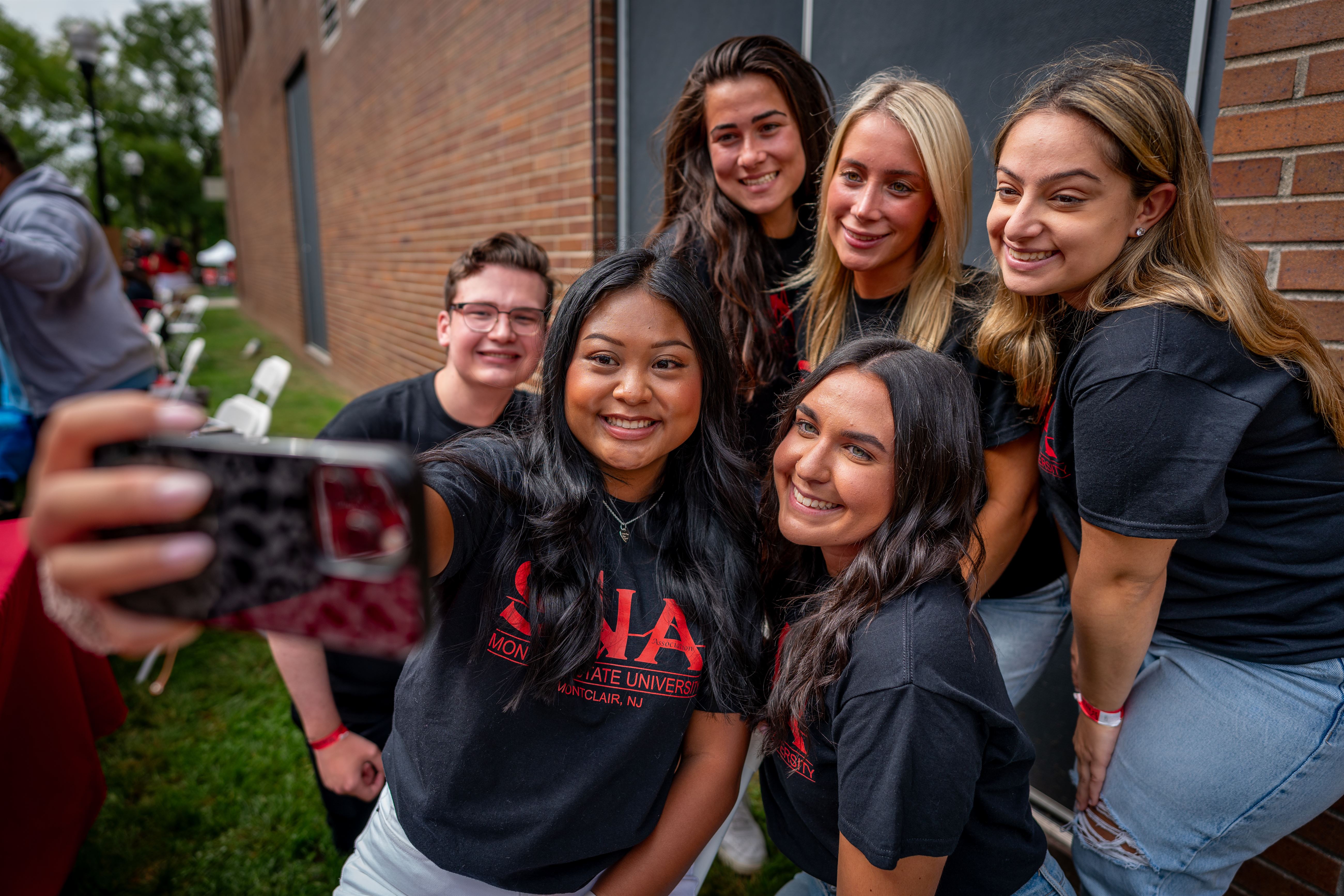Students from the Montclair State University Student Nurses Association take a selfie at Red Hawk Day, Tuesday, August 29th, 2023.