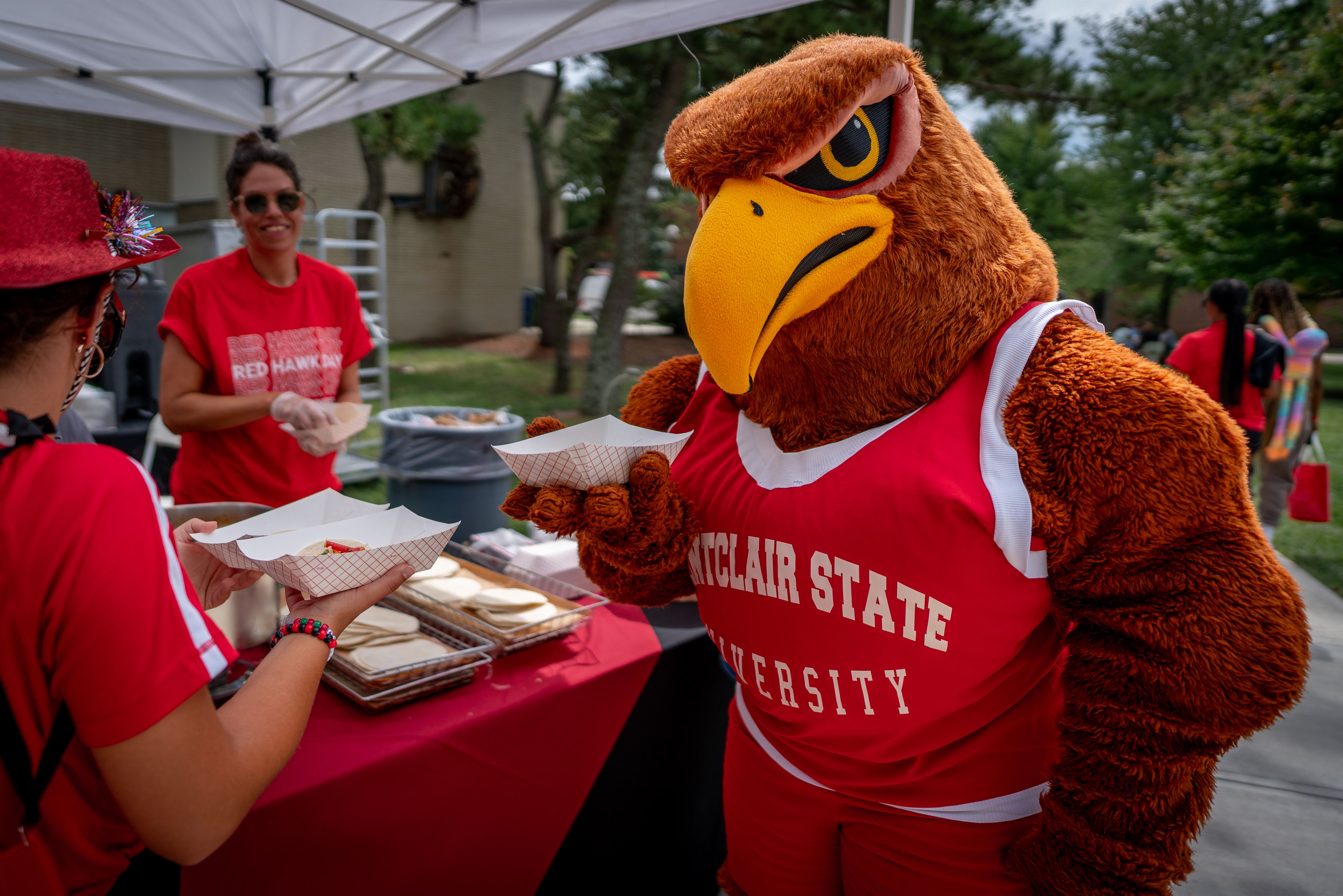 Rocky enjoying some food at Red Hawk Day, Tuesday, August 29th, 2023.