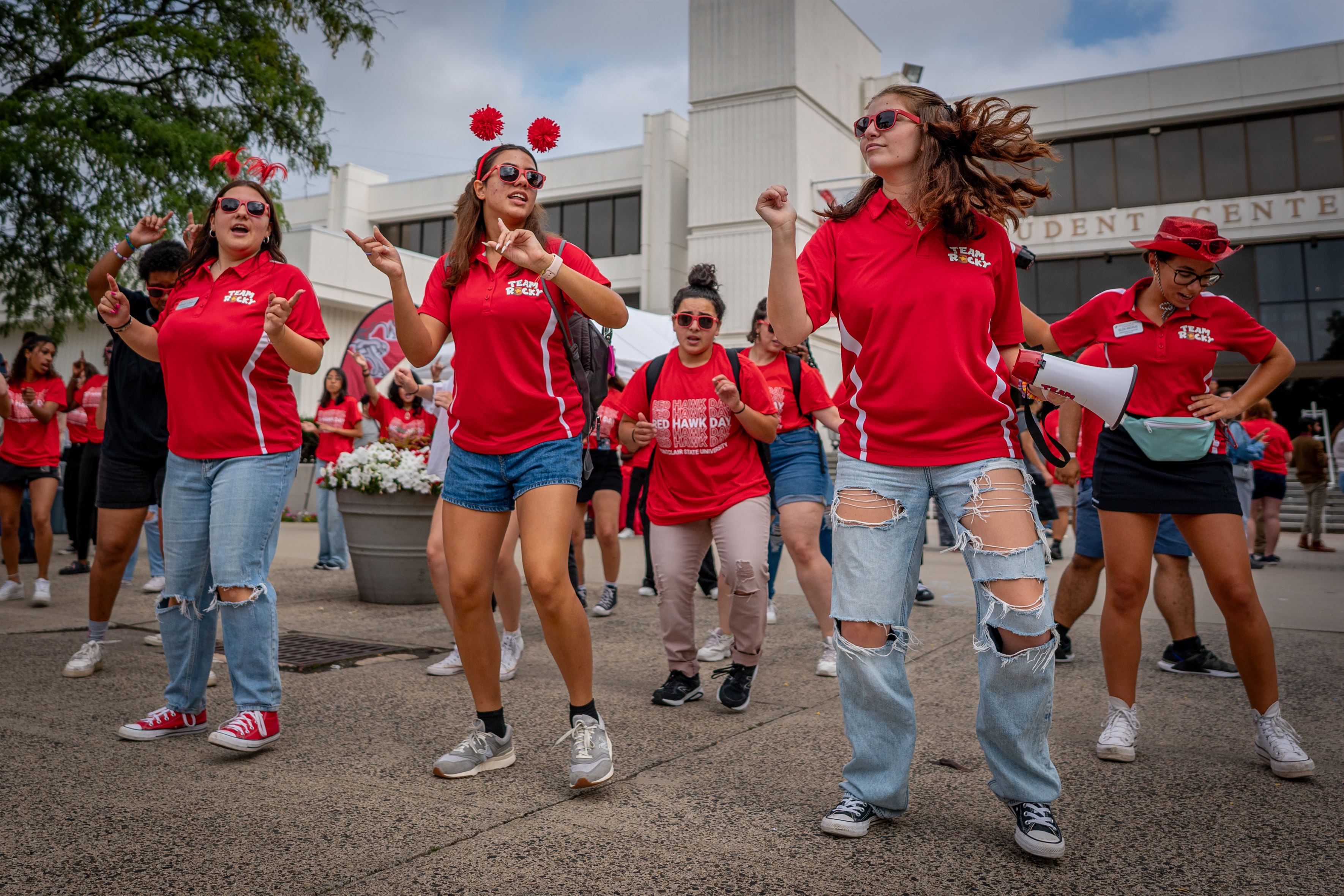 Students dance at the student center quad during Red Hawk Day. Karsten Englander | The Montclarion