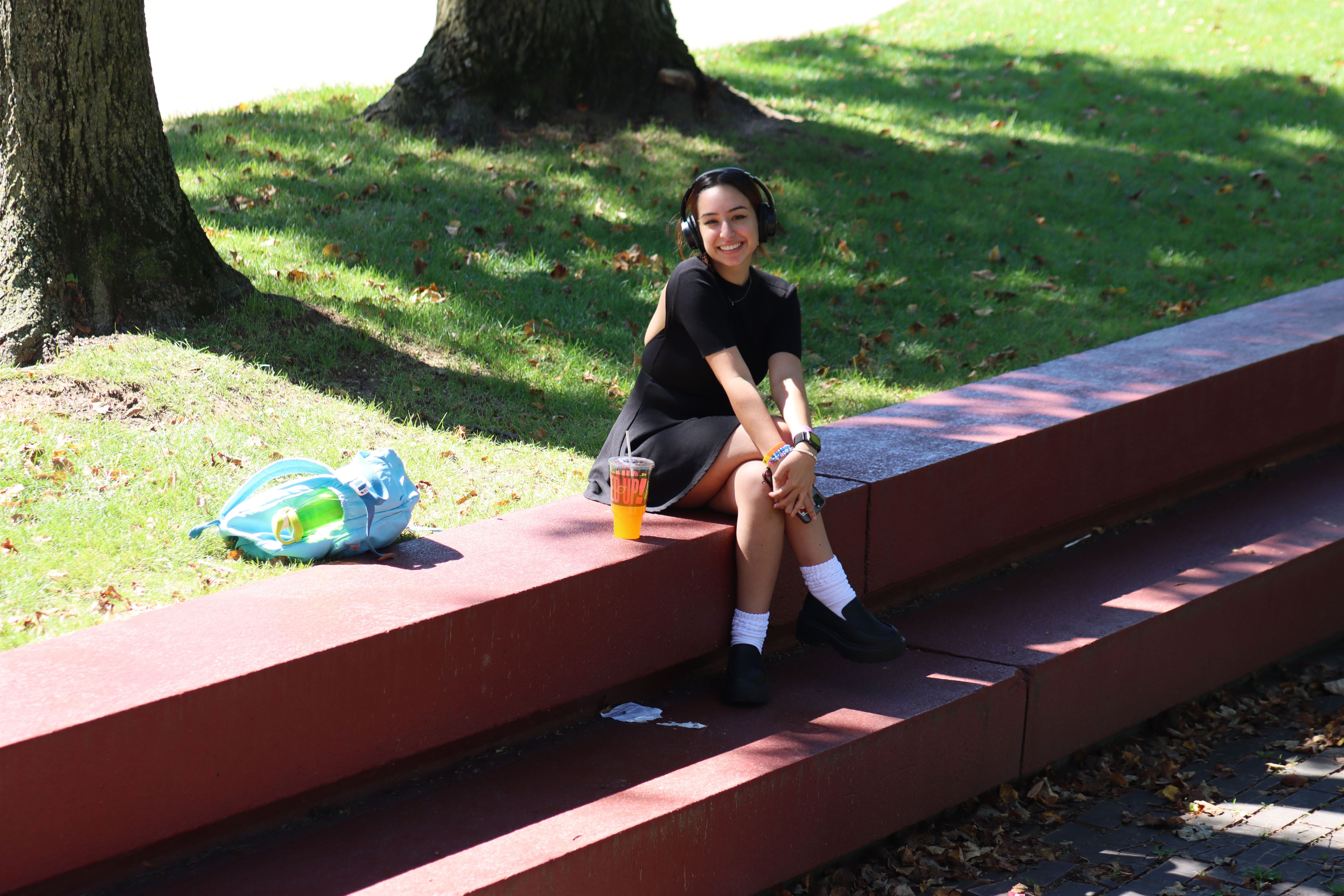 Jenna Marinelli, a Montclair State Freshman, smiles from ear to ear as she enjoys a beautiful day in the quad.
Photo courtesy of Sarah Kurz