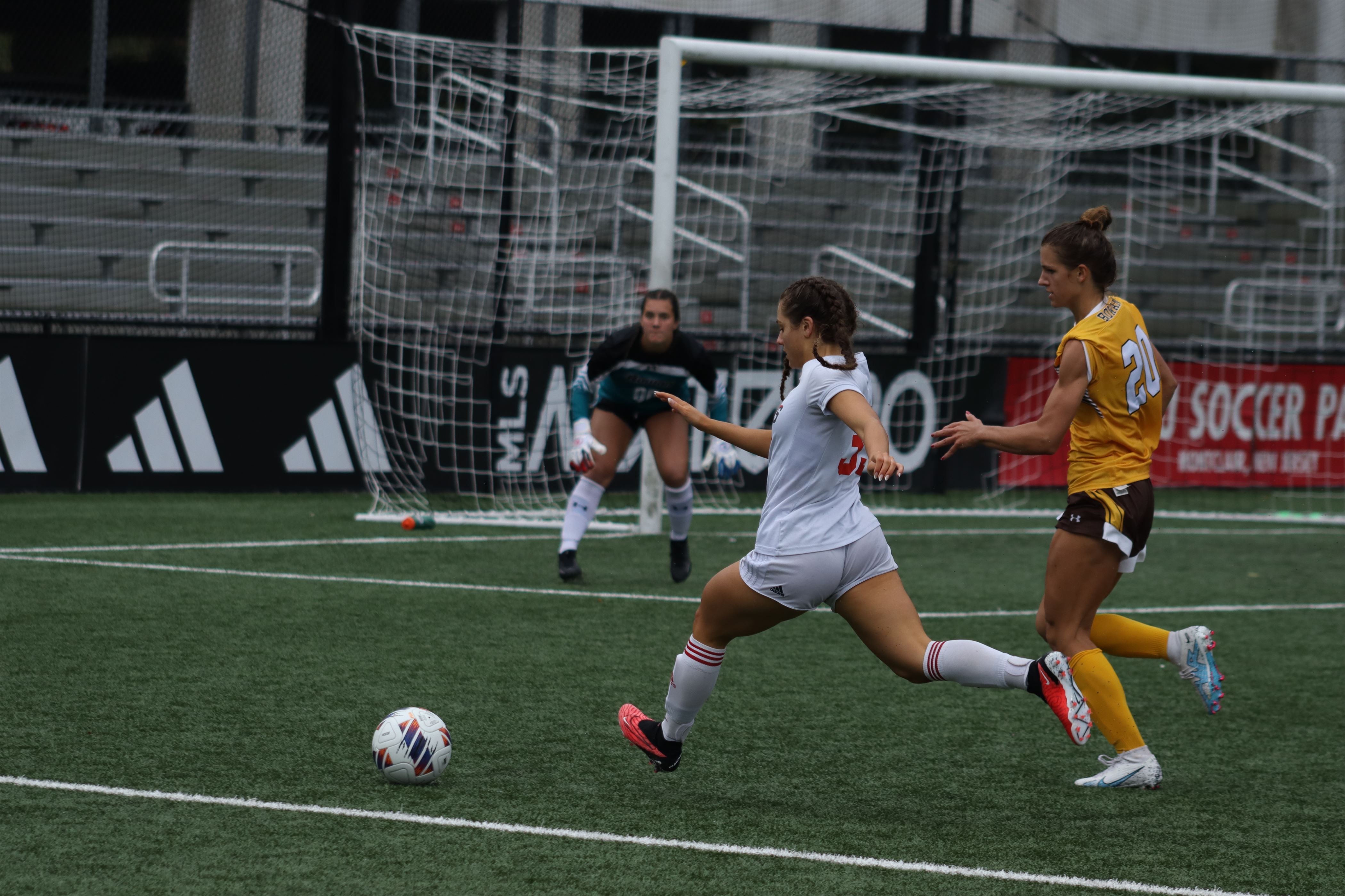 Freshman forward Gianna Curci attempting to create opportunities in the box. Photo courtesy of Trevor Giesberg